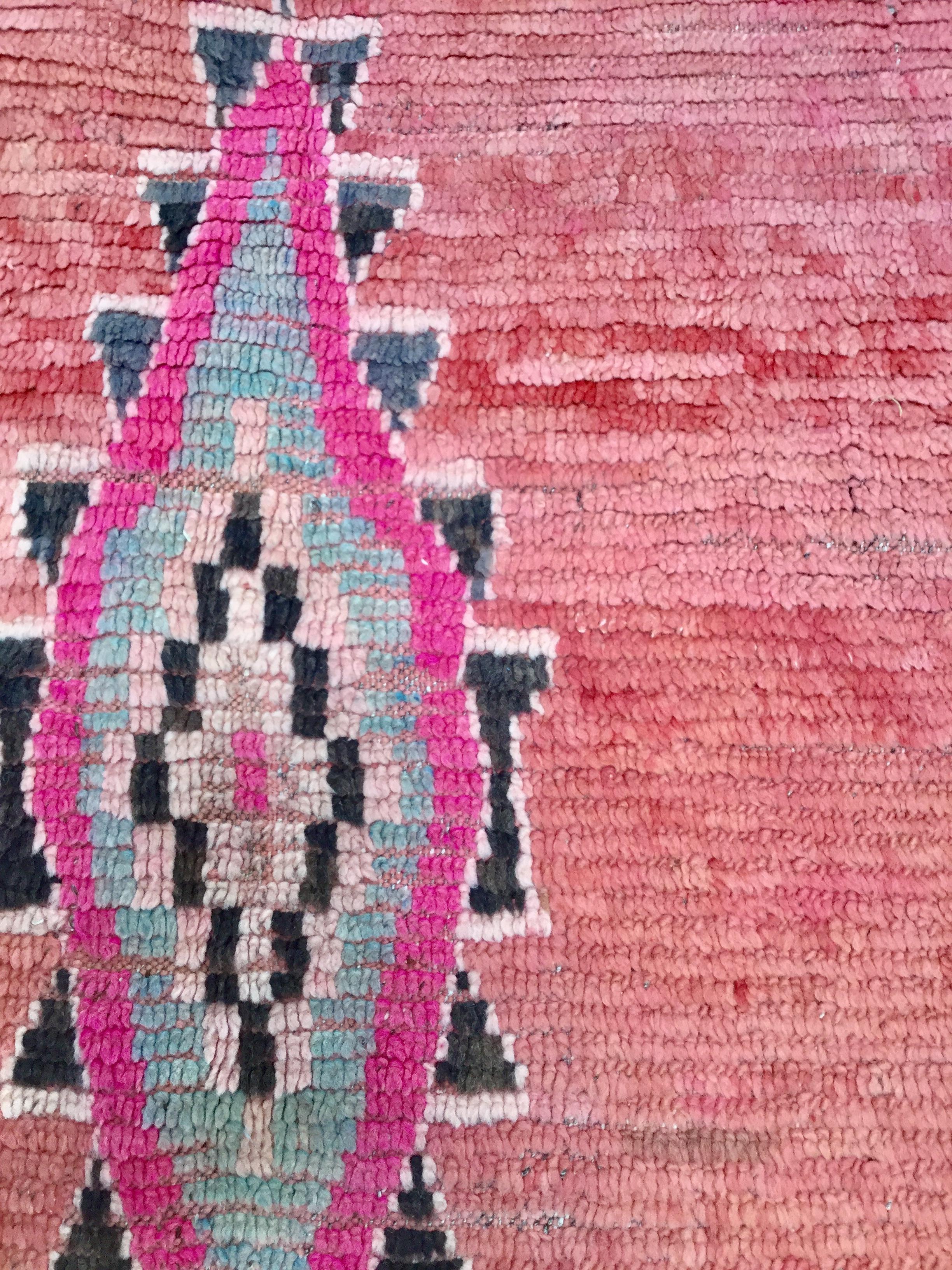 Vibrant, handmade Moroccan wool rug, perfect for brightening up any muted room!