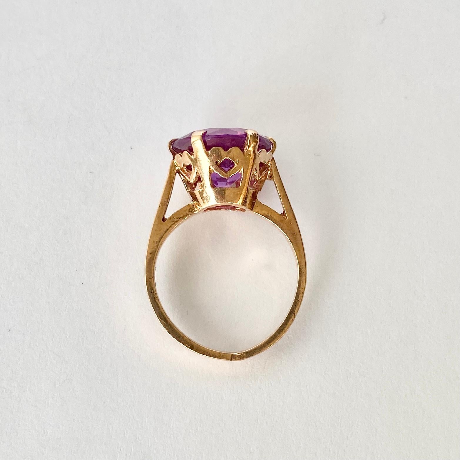 This sweet ring holds a round pink topaz which is perched up high on a heart gallery in simple claws. The ring is modelled in 9carat gold.

Ring Size: I 1/2 or 4 1/2 
Height Off finger: 8mm
Stone Diameter: 11.5mm

Weight: 3.8g