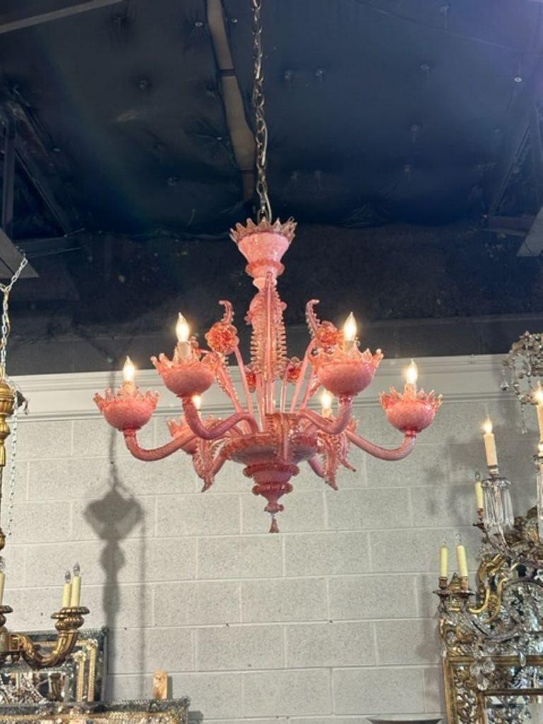 Outstanding vintage pink Venetian glass chandelier. Featuring decorative leaves and flowers. Lovely!