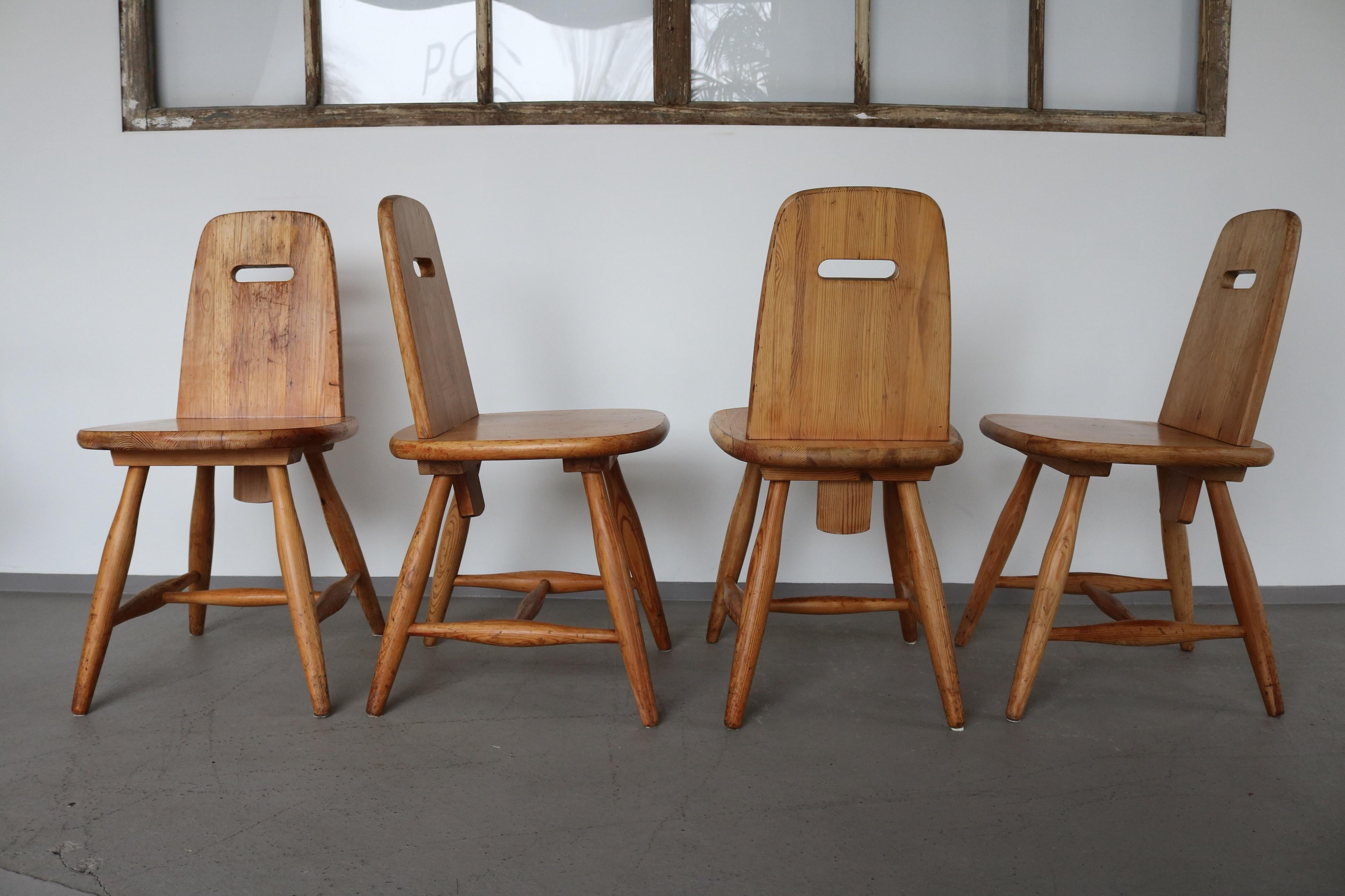 Set of 4 dining chairs designed by Eero Aarnio in solid pinewood for Laukaan Puu.
 
