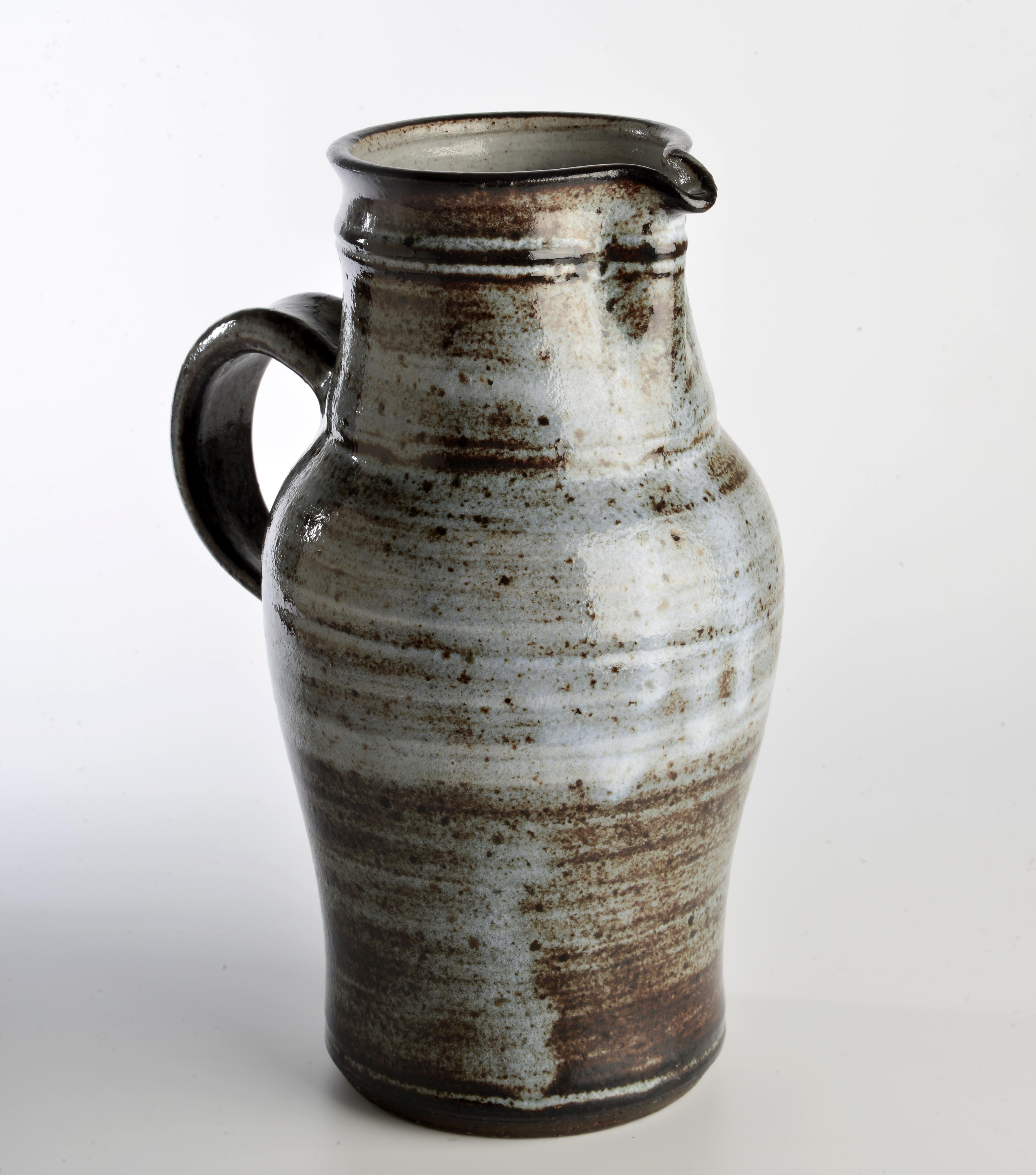 Stoneware pitcher made by Roger Collet in Vallauris (famous town for ceramic in the south of France) in the 60s and 70s. Roger Collet (1933-2008) was born in Switzerland and graduated from the ceramics school of Chavannes Rennens in 1952. He moved