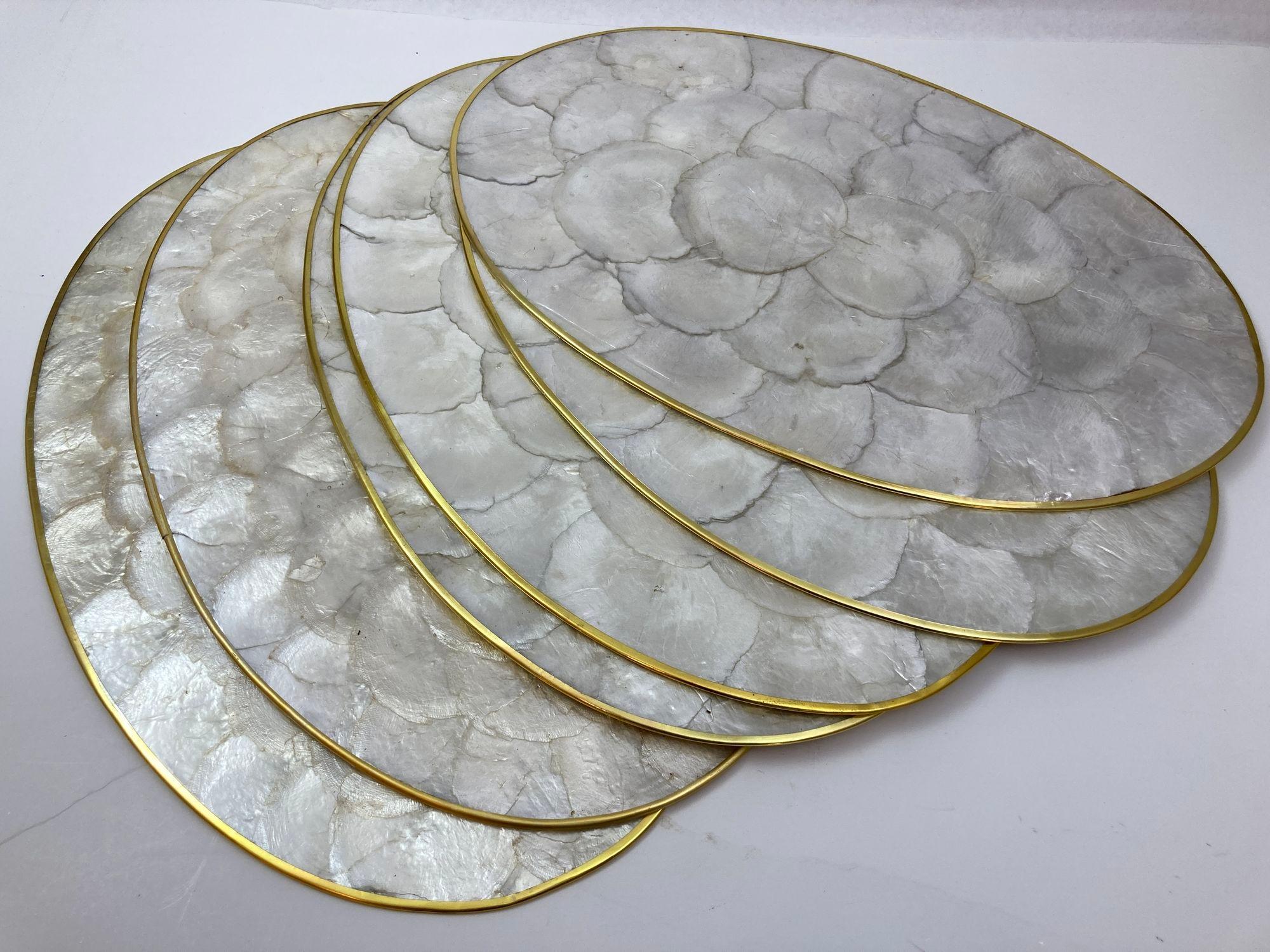 Vintage Placemats Set of 6 in Natural Capiz Pearl Shell.
This gorgeous vintage set of Capiz shell placemats, coasters and napkins, comes straight from 1970s.
Vintage Round Capiz Shell Placemats or Chargers.
There are six lovely handmade place