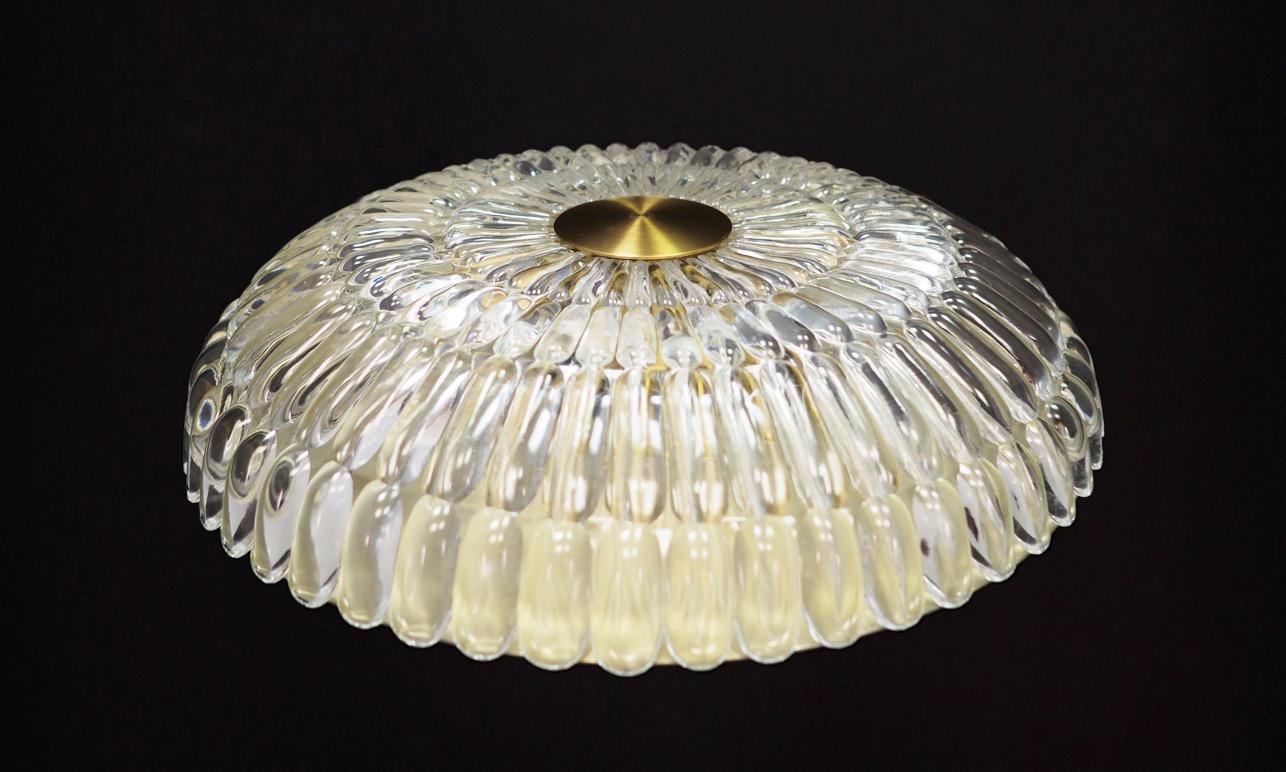 Fantastic ceiling light / plafon from the 1960s-1970s, Scandinavian design. Made of blown glass. Maintained in good condition (minor bruises and scratches), directly for use.

Price per piece.

Dimensions: height 10 cm, diameter 38 cm.