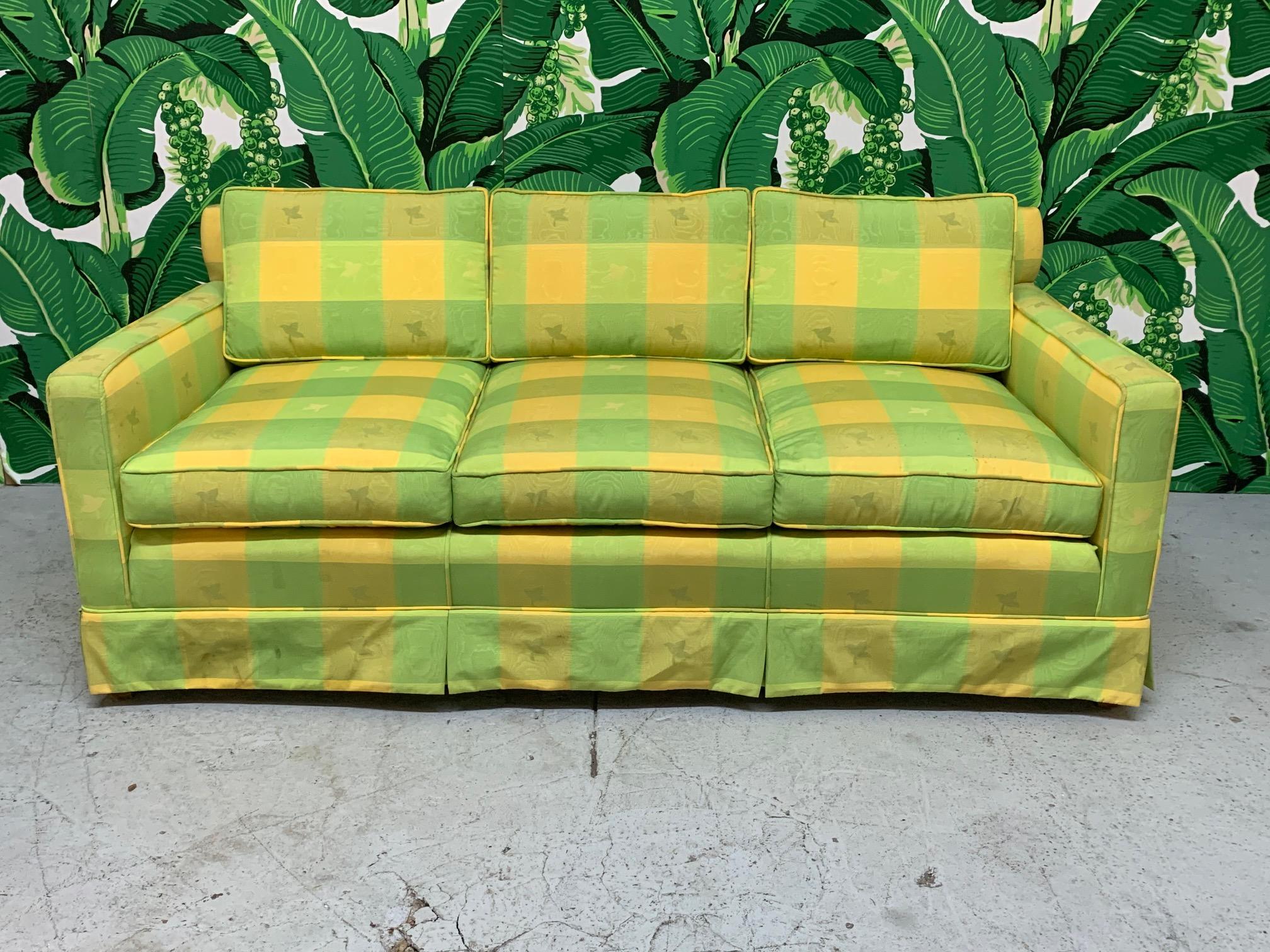 Vintage green and yellow plaid sofa in the manner of Dorothy Draper. Cheerful and fun print that will add a bright touch to any decor. Very good condition structurally and cosmetically with no stains or tears to fabric.
