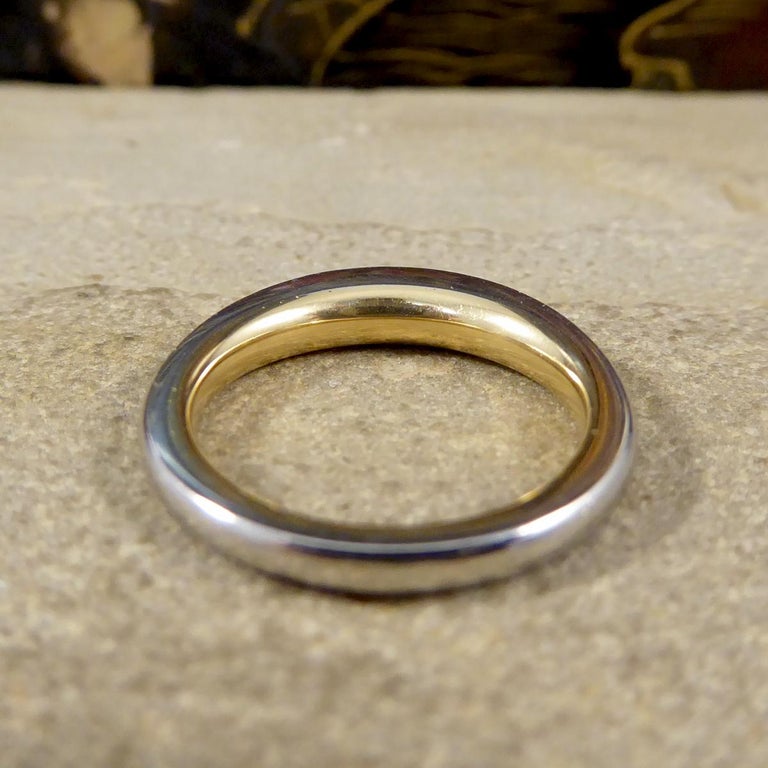 A plain 18 carat gold wedding ring