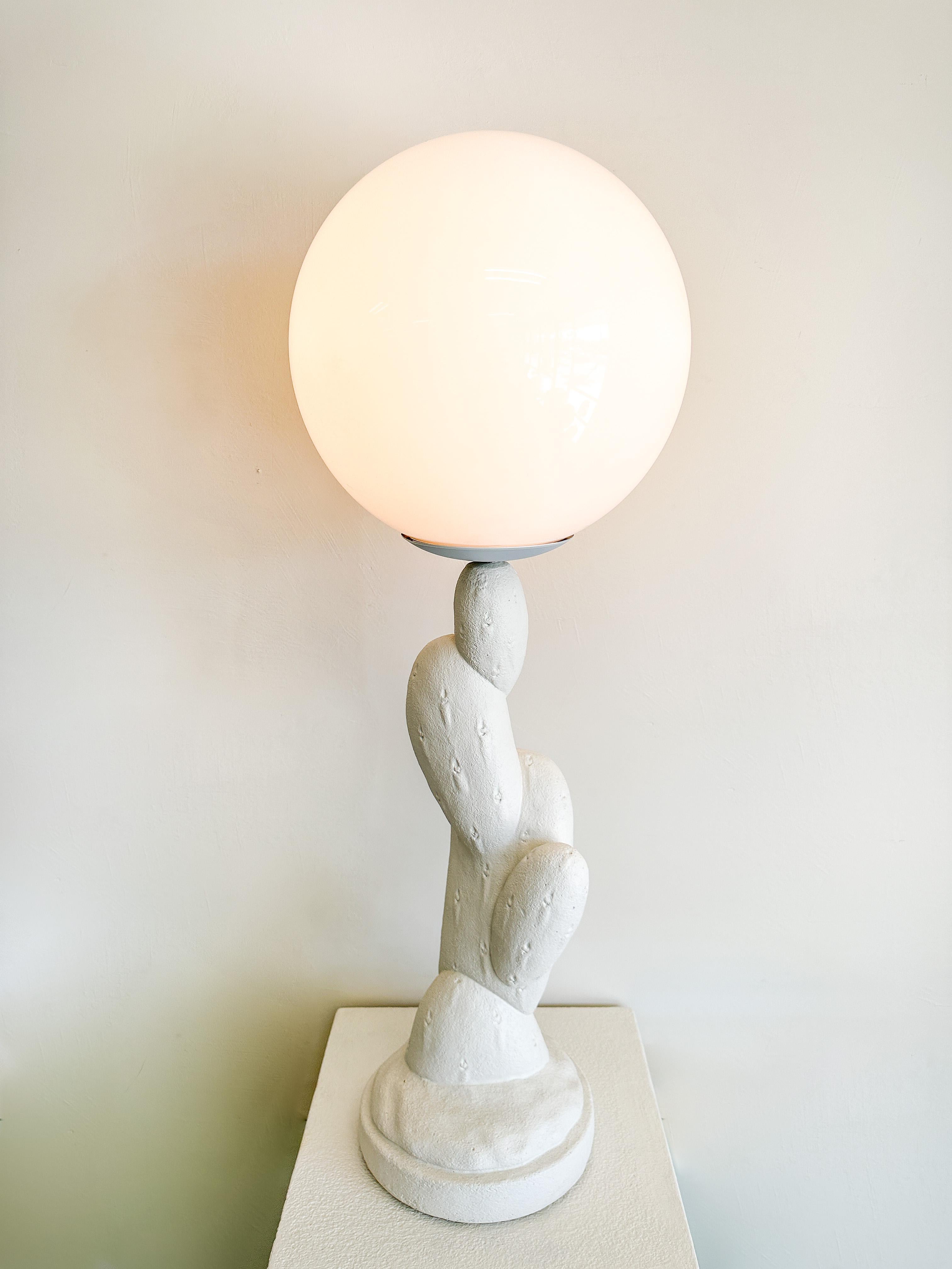 Vintage Cactus Plaster Lamp. 

The lamp is made out of plaster and the lampshade is made out of acrylic. 
Solid and very heavy. 

Color: Off White 

Condition: In great vintage condition. No chips or cracks. 
It takes E-26 bulb.