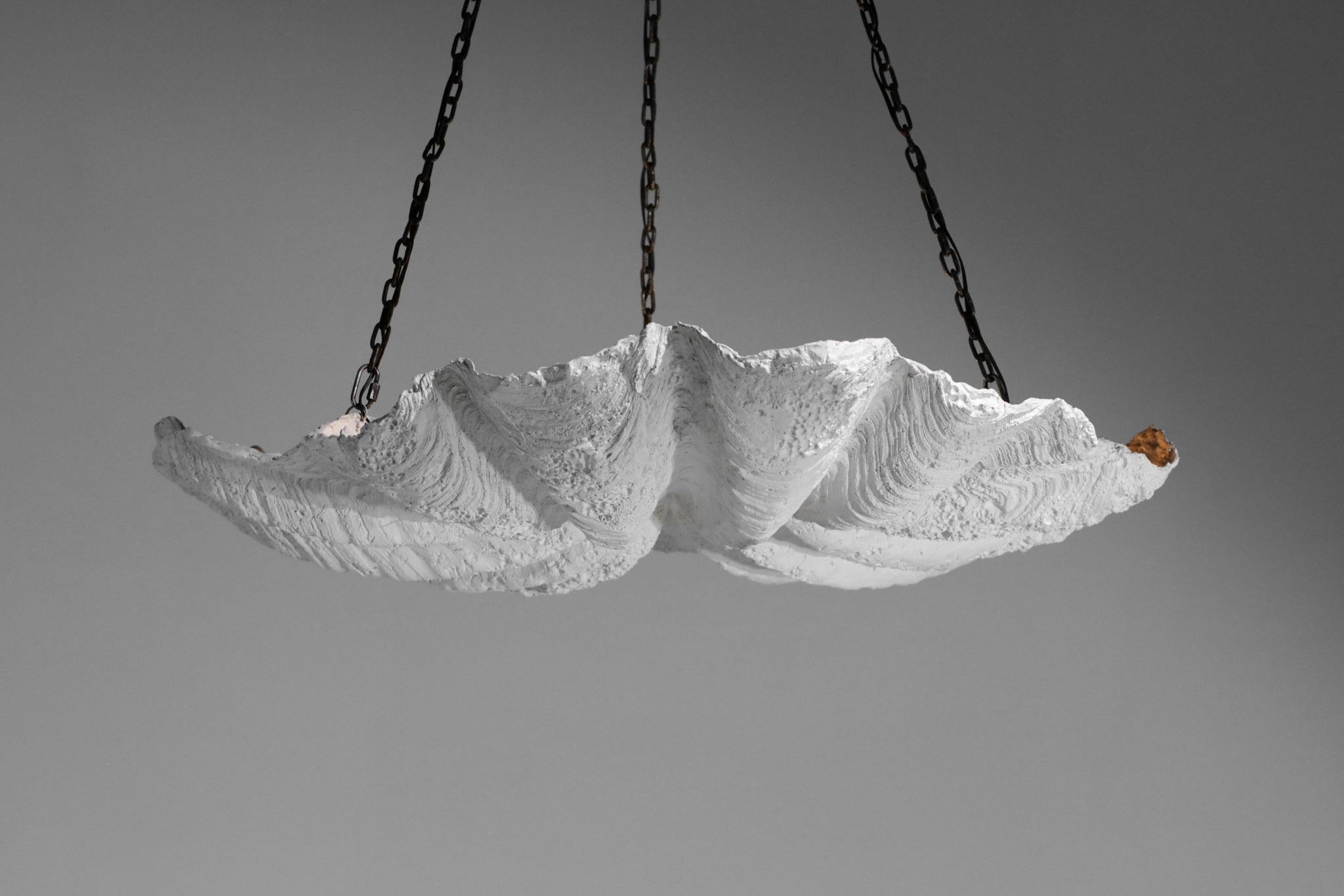 Very nice contemporary chandelier from the 80's in the style of the work of Diego Giacometti & Jean Michel Frank. Plaster structure representing a huge shell very decorative, and metal chains. Excellent vintage condition.