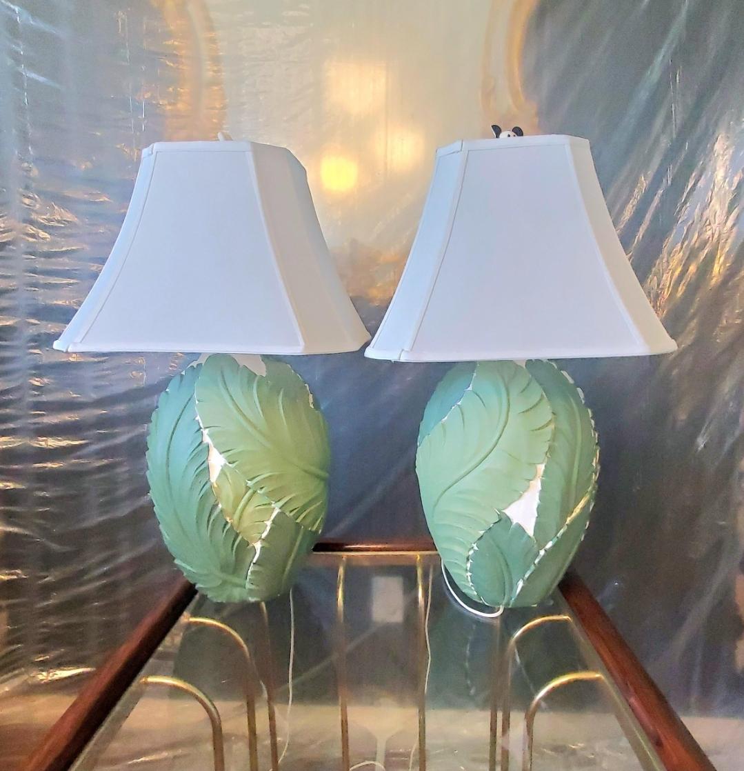 Post modern.
Hand painted.
Serge Roche style.
1980s Coastal, Palm Beach regency, Hollywood regency, plaster banana leaf table lamps.
Porcelian Mickey and White glove finials.
Shades included.
Perfect functionality.
Purchased at a Disney property
