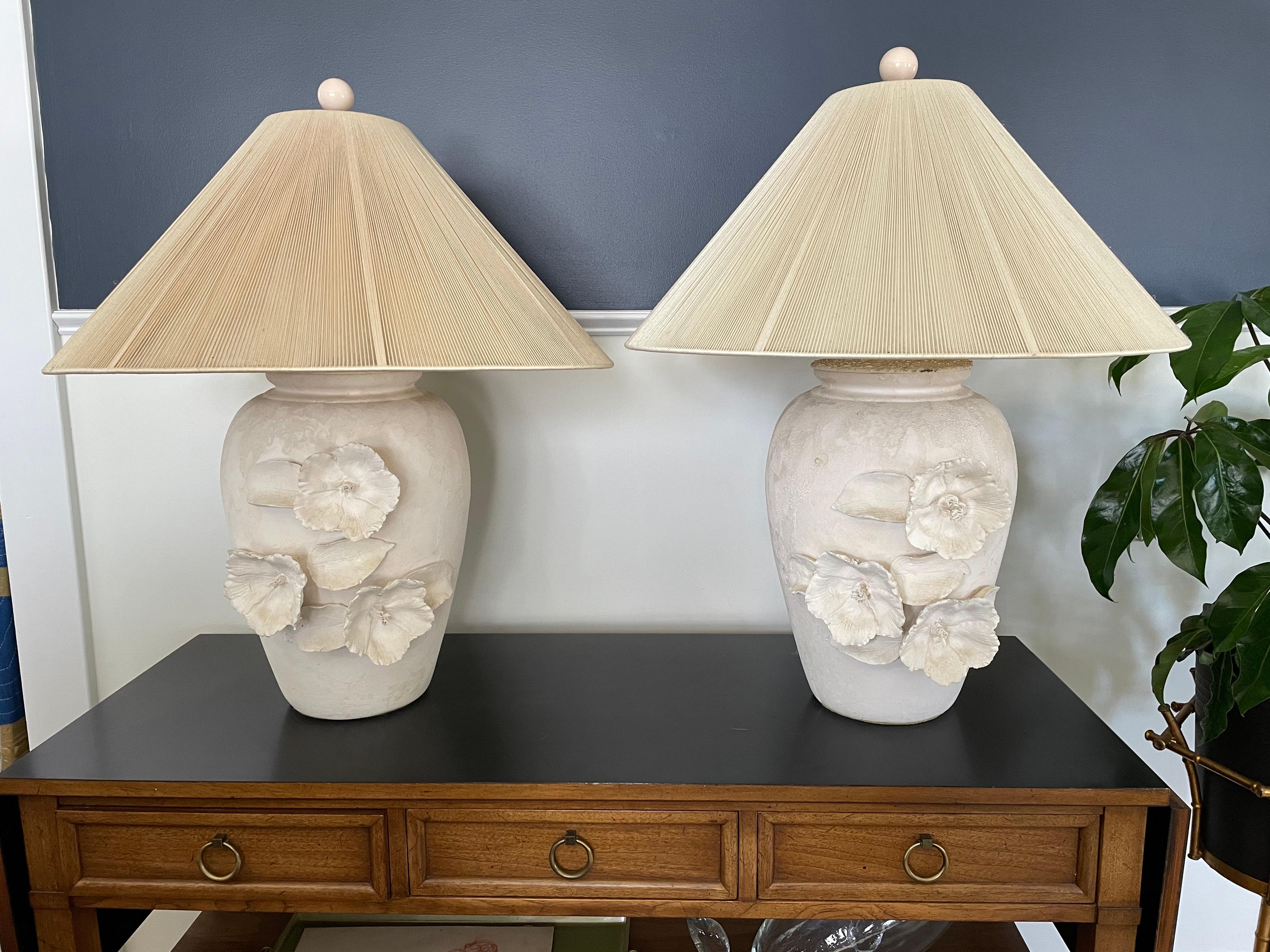 Spectacular pair of plaster lamps with such intricate floral reliefs. Delicate yet imposing. The flower anatomy draws you into the detail and artistry. Handmade Hilo Steiner string shades.
Curbside to NYC/Philly $300