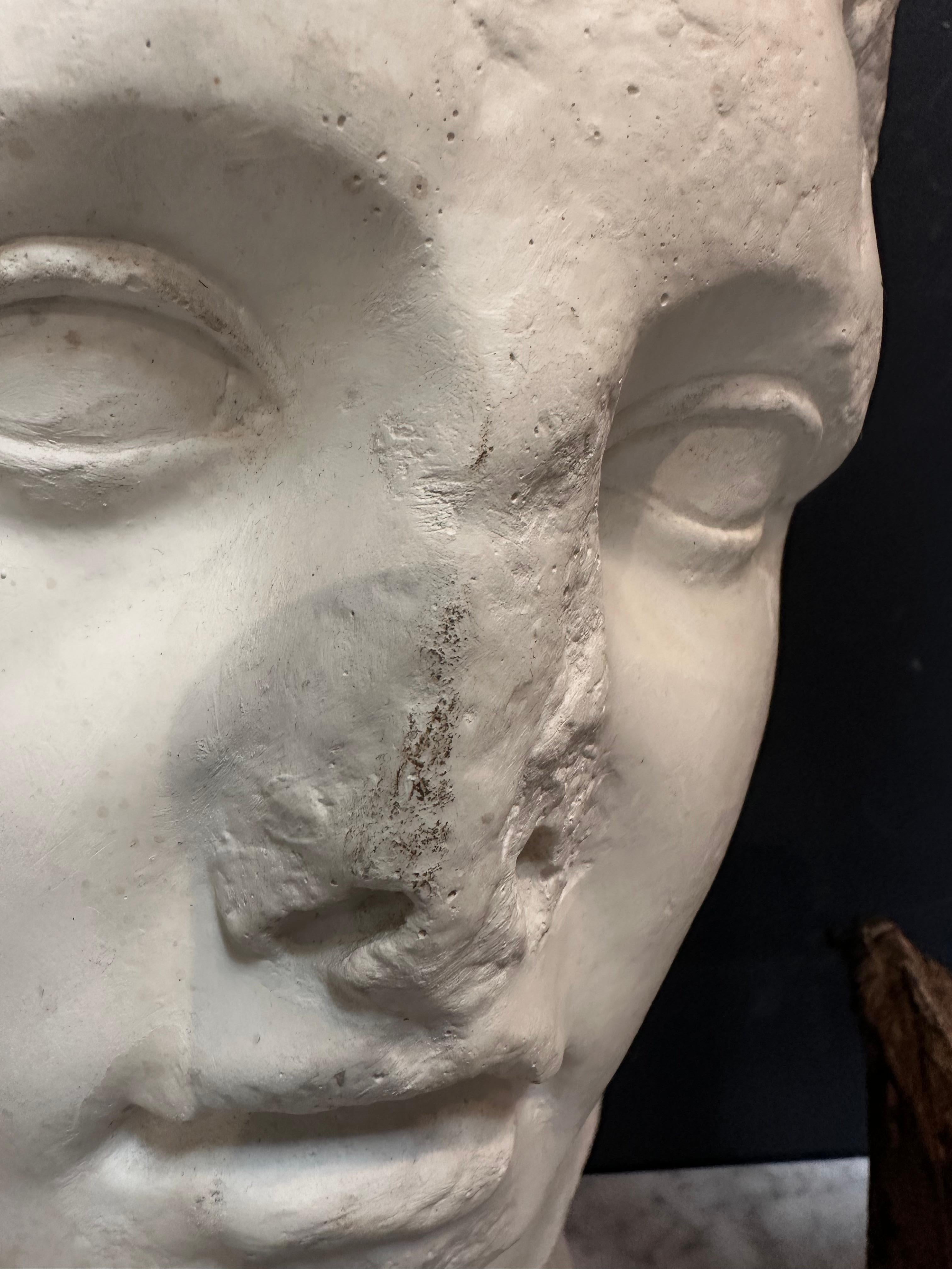 The Vintage Plaster Roman Head Sculpture from the 1970s is a classic art piece capturing a Roman-style head in plaster material. Crafted during the 1970s, this sculpture showcases the artistic style of the era with its detailed portrayal of a Roman