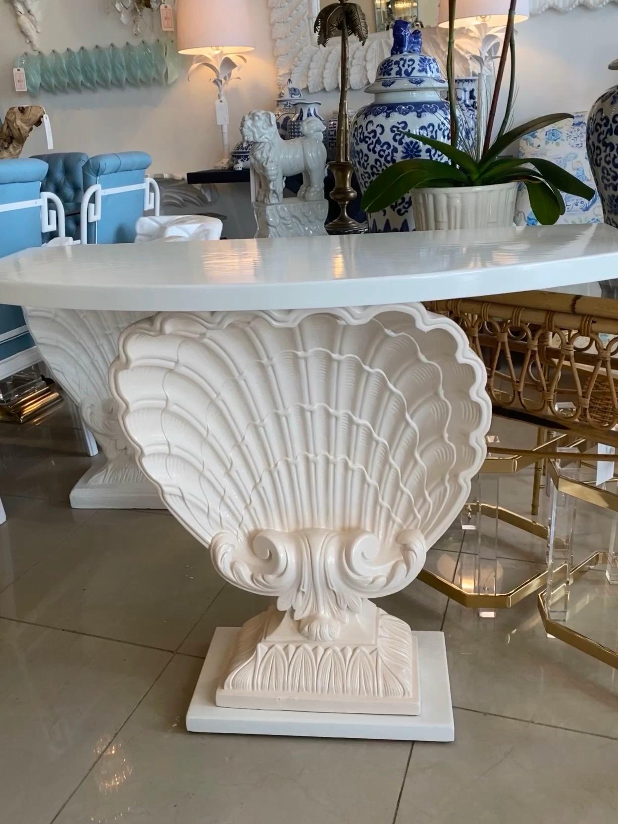 Lovely vintage seashell scallop clam shell console table. Newly lacquered in a lovely white and faint coral. I have another available if you need a pair. In the style of Edward Wormley.