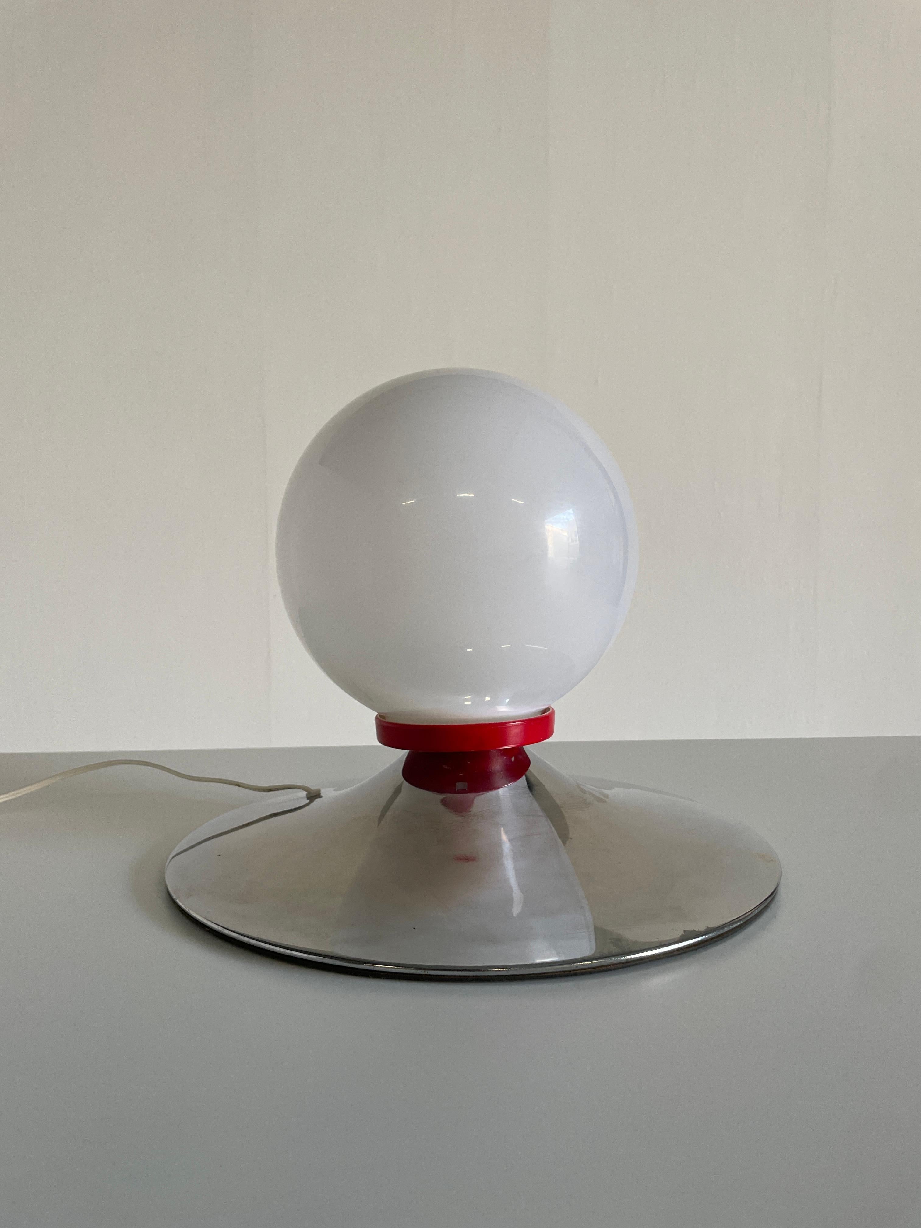 A beautiful and elegant, space age vintage white plastic table or floor lamp, made from a chrome base and white plastic sphere shade.

The lamp is in its original vintage condition. It has some smaller signs of age, but overall very well maintained.