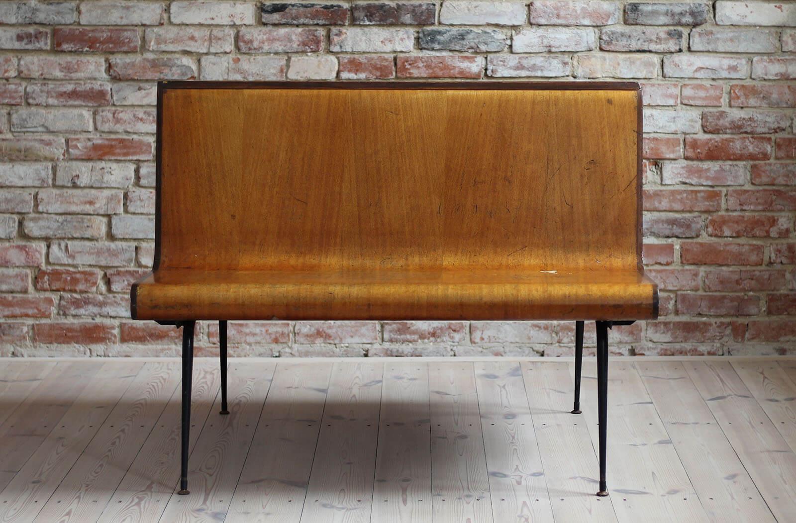 Vintage platform bench from circa 1950s or 1960s. As the previous owner claimed he had bought it in Melbourne and it served at a waiting room or platform of train station. The bench is set on a metal frame with movable feet, seating is made of wood