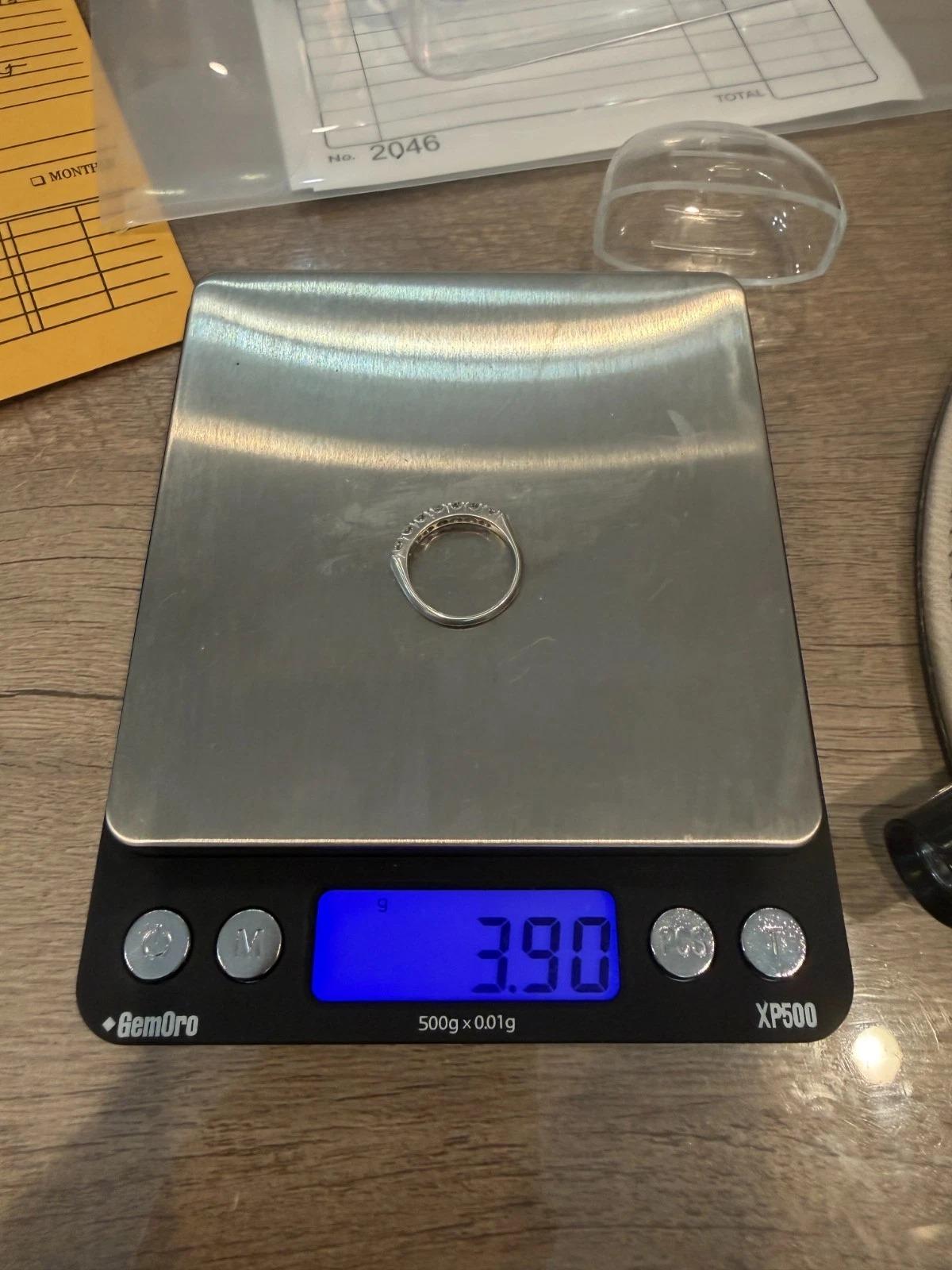 Anello vintage in platino da 0,55 carati con 7 diamanti rotondi Brilliante Misura 5,5 in vendita 5