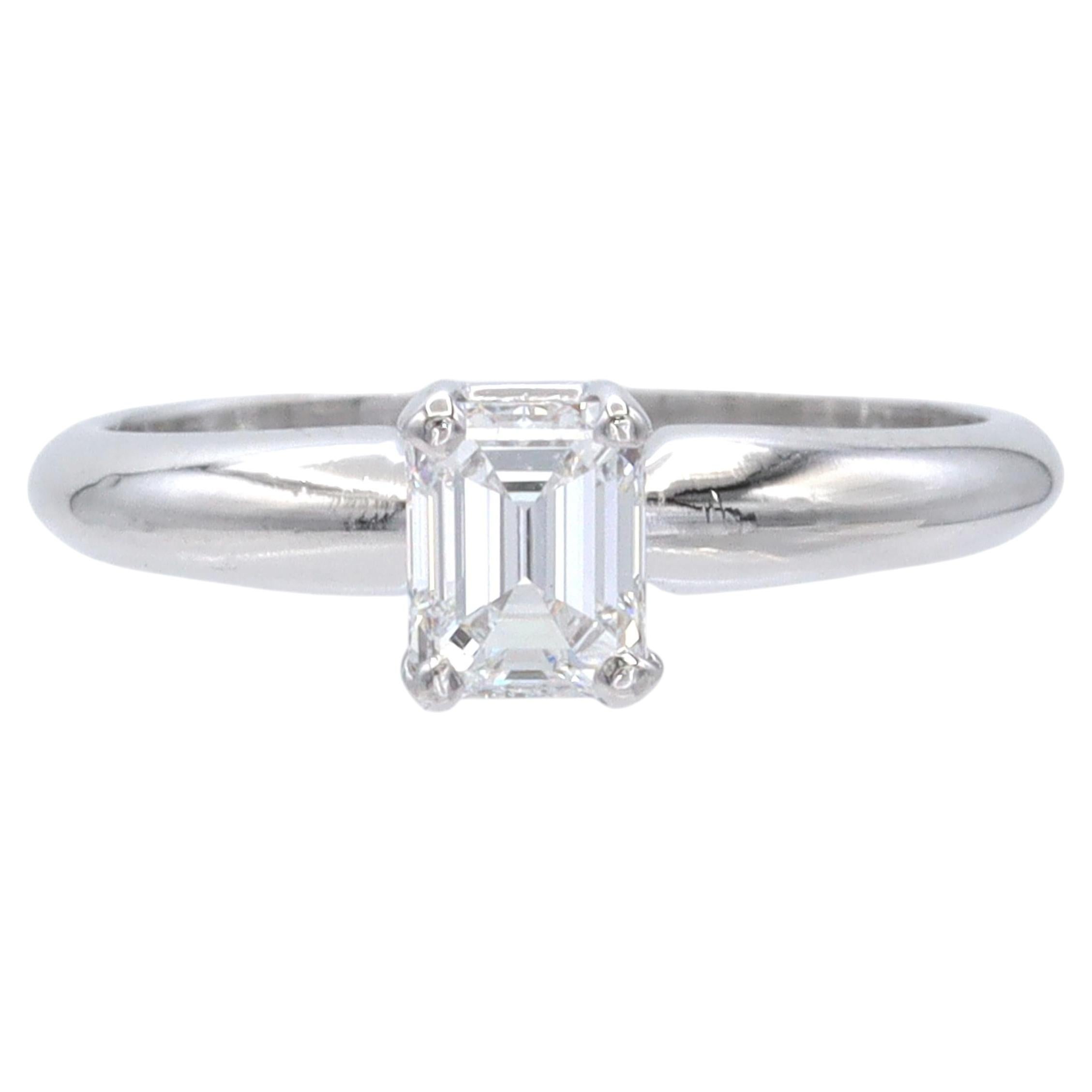 Vintage Platinum 0.59ct Emerald Cut Diamond Solitaire Ring For Sale