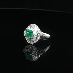 Vintage Platinum 0.651ct Colombian Emerald + 0.61ct Round Baguette Diamond Ring