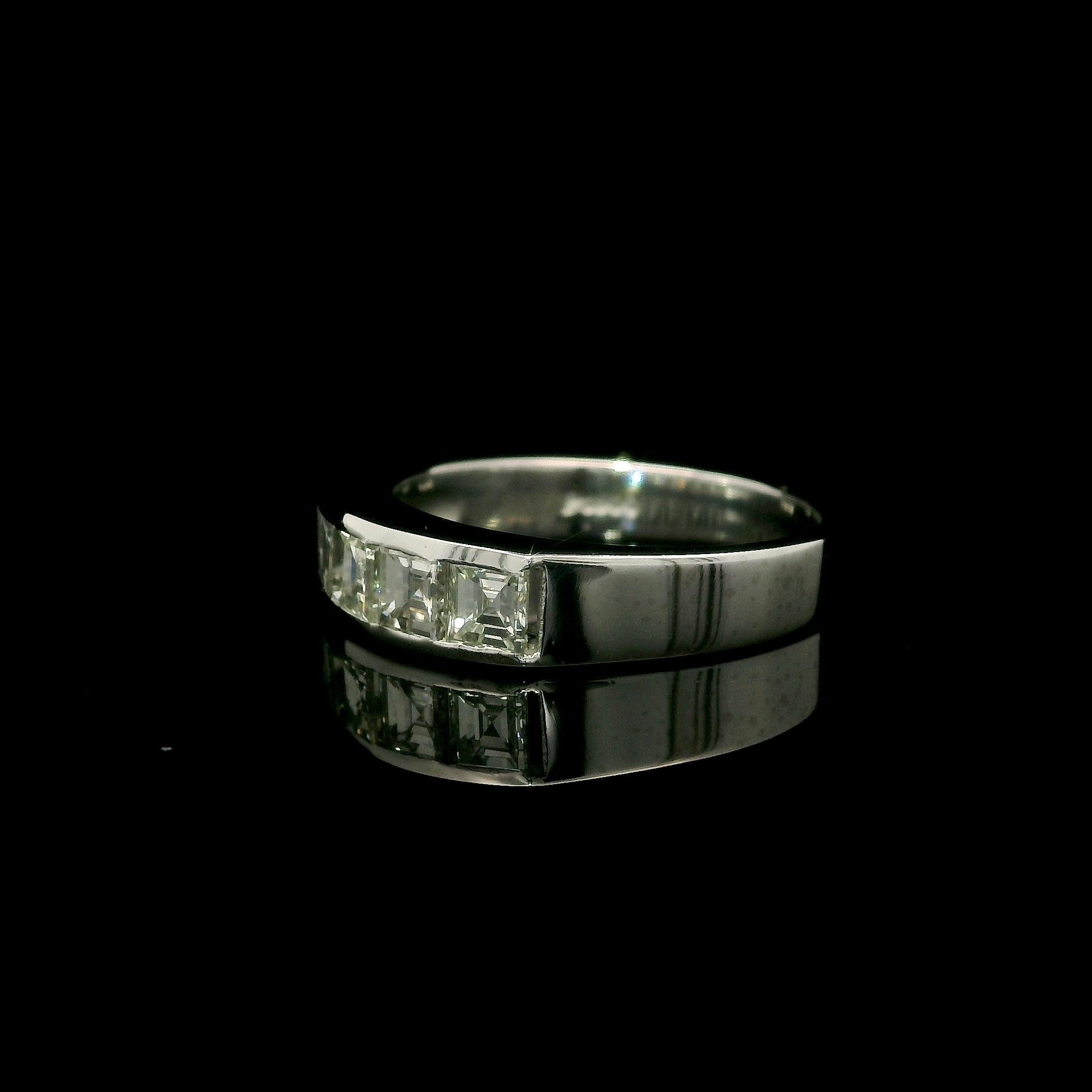 –Stone(s)–
(5) Natural Genuine Diamonds - Square Step Carre Cut - Channel Set - Nice Brilliant White Color - VS1-SI2 Clarity - 1.01ctw (exact)

Material: Solid .850+ Platinum (tested) - Stamped PT900
Weight: 4.87 Grams
Ring Size: 5.0 ( fitted on