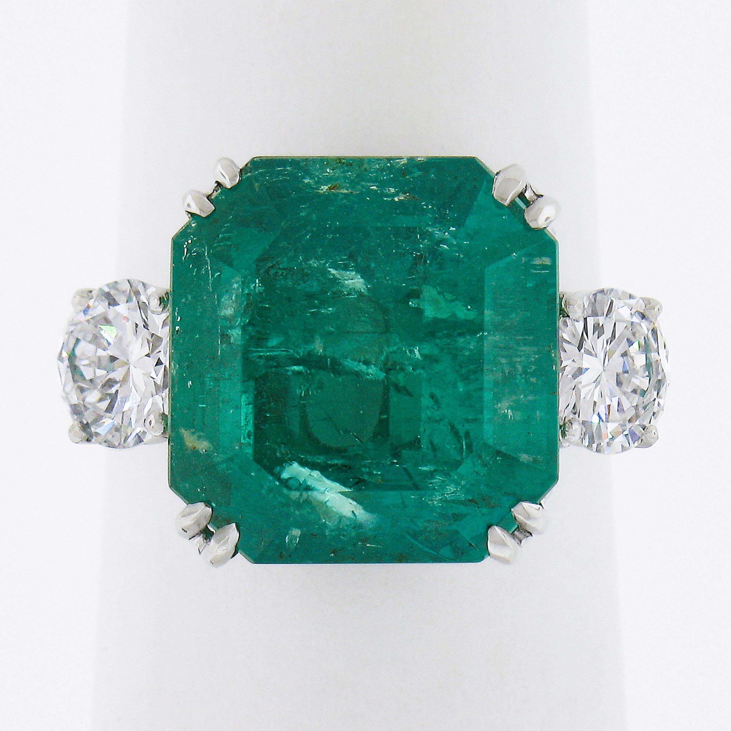 --Stone(s):--
(1) Natural Genuine Emerald - Square Cut - Minor Oil - Dual Prong Set - Lively Bright Green Color w/ Natural Inclusions - 9.26ct (exact - certified)
** See Certification Details Below for Complete Info **
(2) Natural Genuine Diamonds -