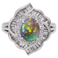 Anello d
epoca in platino da 1,15 ct B4 con cristallo nero, opale e diamanti