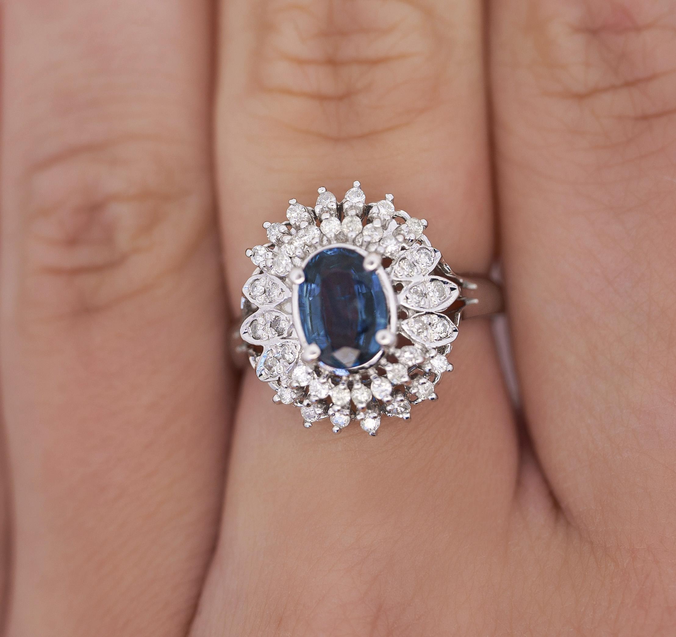Oval Cut Vintage Platinum 1.18 Carat Oval Blue Sapphire & Diamond Halo Filigree Ring For Sale