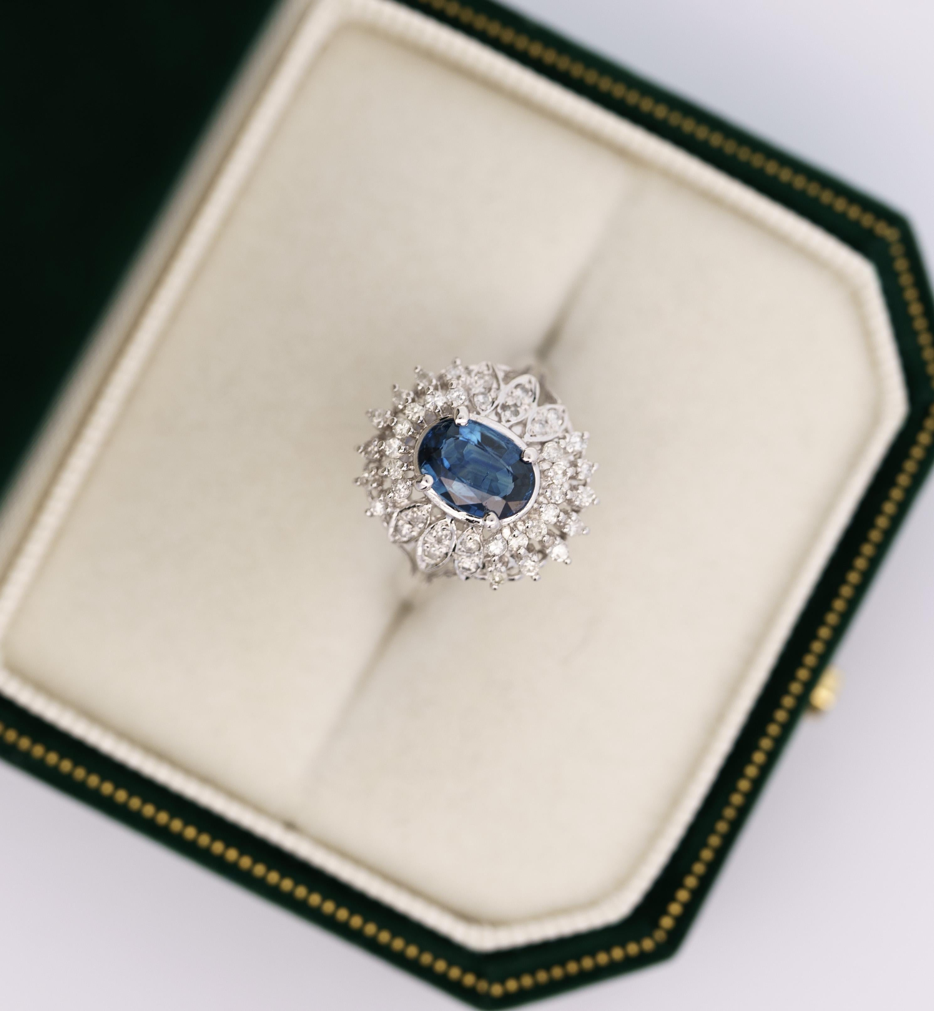 Vintage Platinum 1.18 Carat Oval Blue Sapphire & Diamond Halo Filigree Ring In Excellent Condition For Sale In Miami, FL