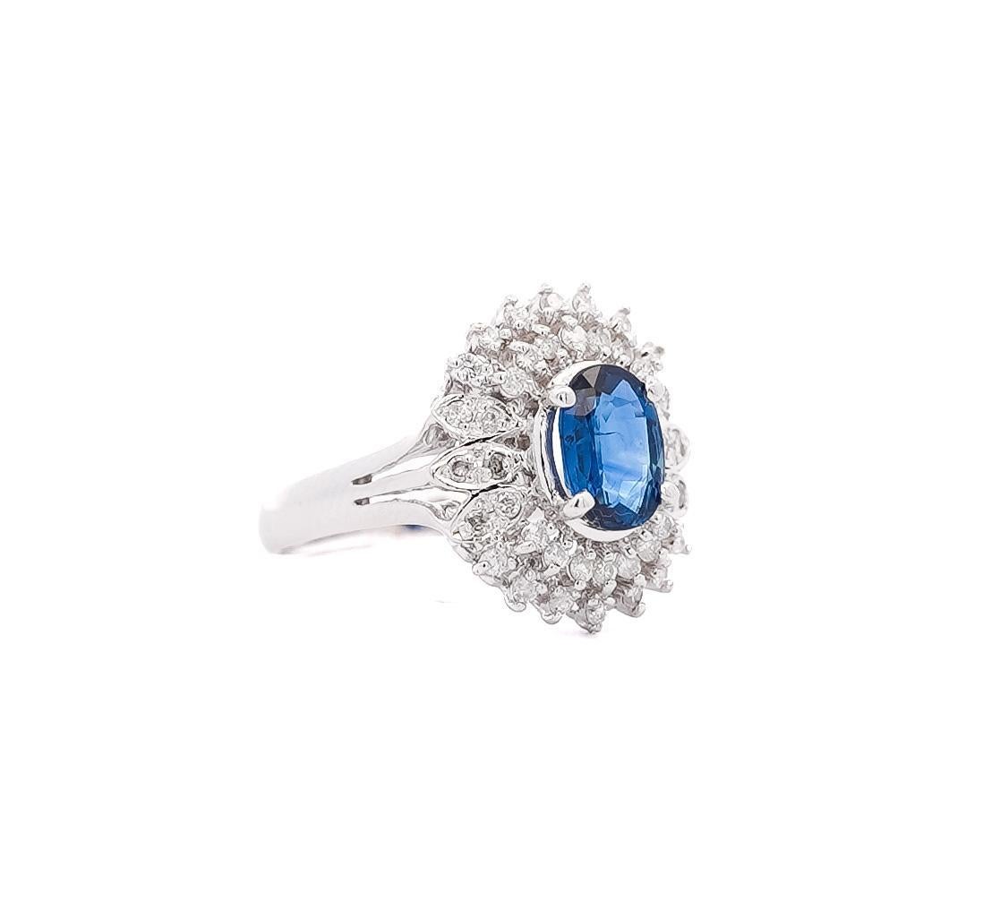 Vintage Platinum 1.18 Carat Oval Blue Sapphire & Diamond Halo Filigree Ring For Sale 2