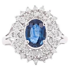 Vintage Platinum 1.18 Carat Oval Blue Sapphire & Diamond Halo Filigree Ring
