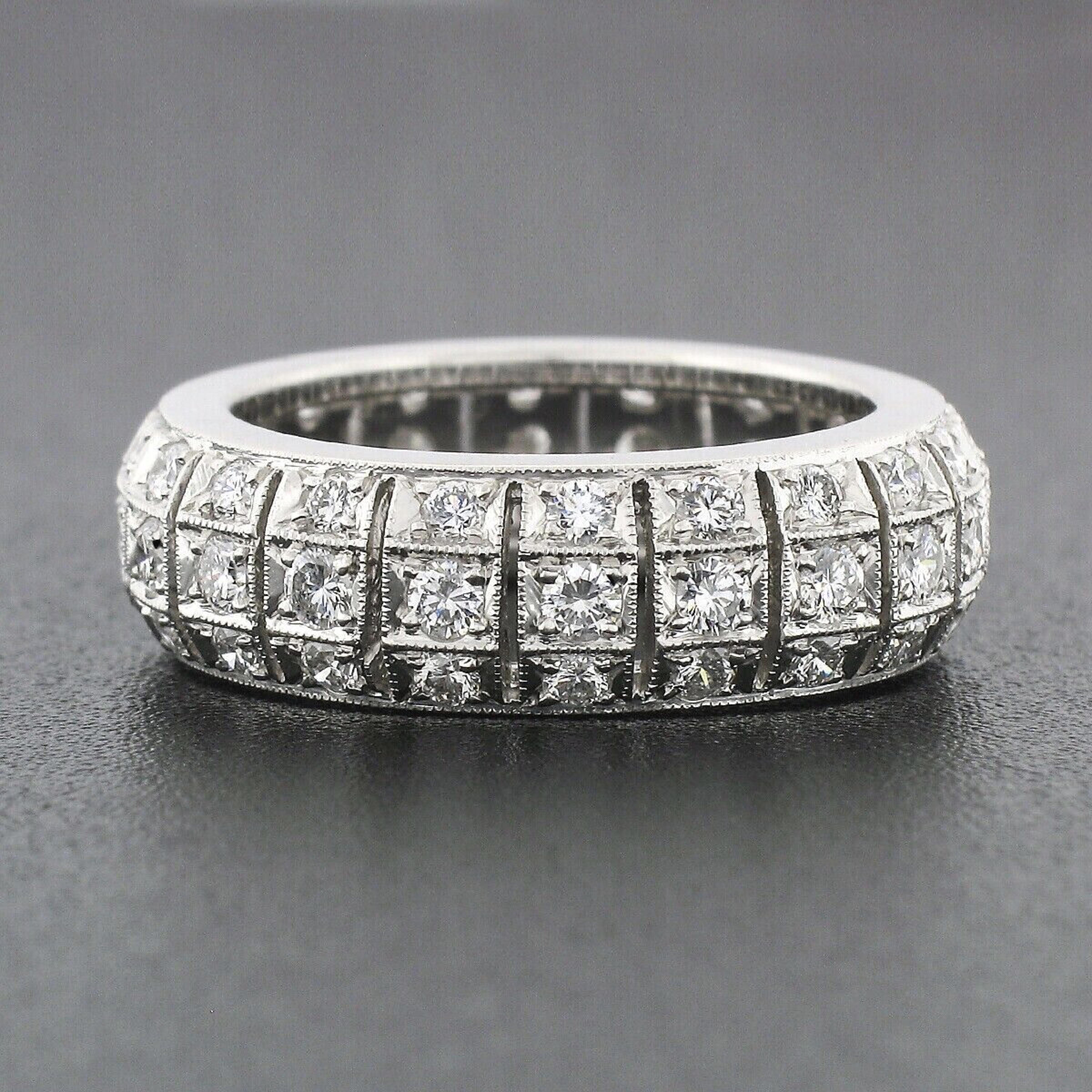 Here we have a truly spectacular vintage diamond eternity band that was crafted from solid .950 platinum. It features 60 very fine quality round brilliant cut diamonds that are perfectly pave set throughout the eternity design. The design of this