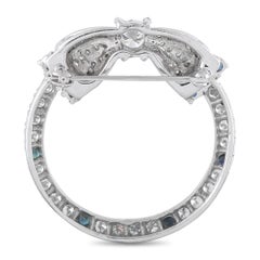 Vintage-Brosche aus Platin mit 1,50 Karat Diamanten und Saphiren in offener Kreisform mit Schleife MF01-062426