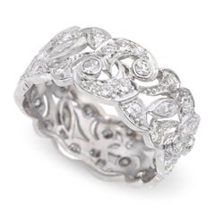 Anillo vintage de platino con diamantes de 1,70 quilates, motivo enredadera y pergamino