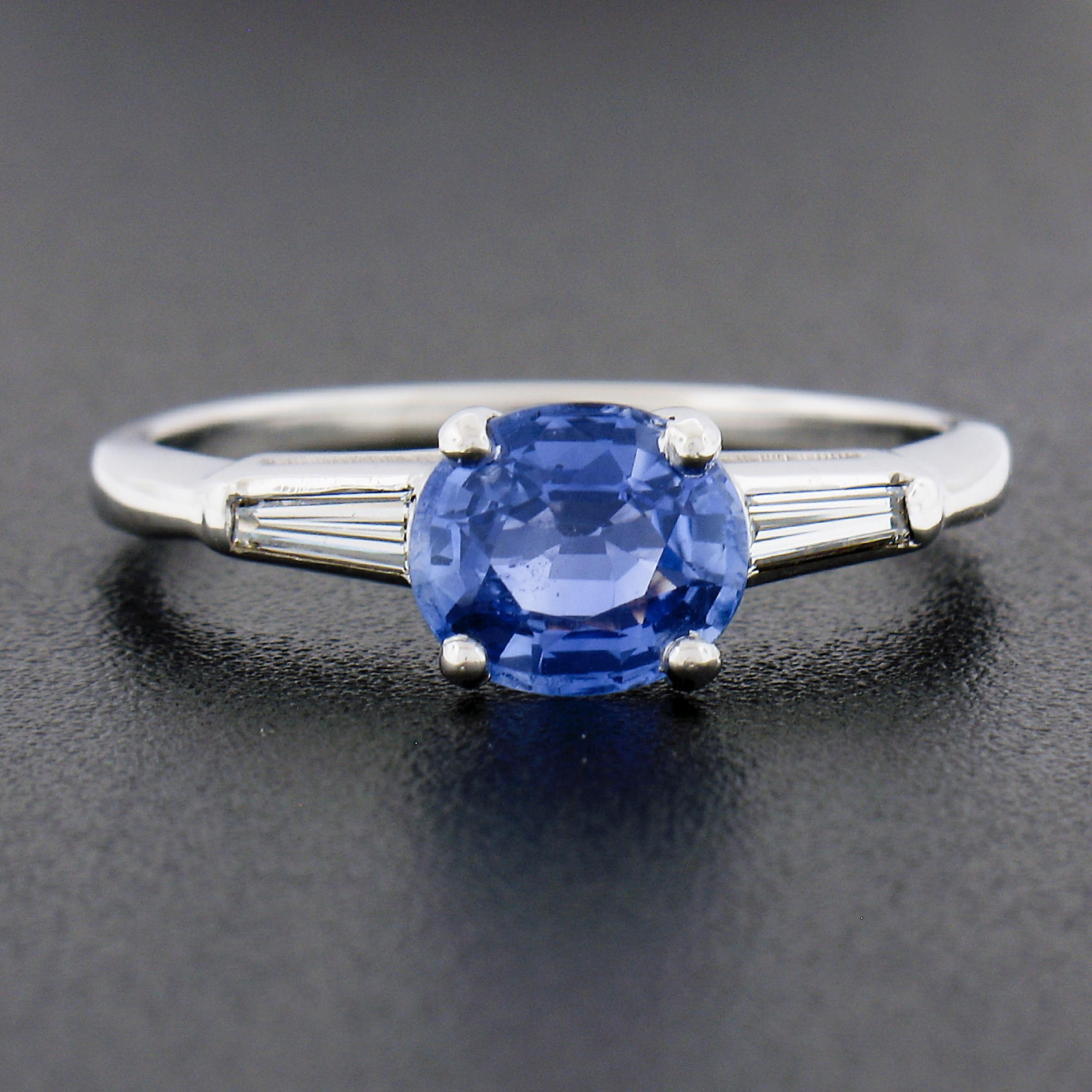 Oval Cut Vintage Platinum 1.82ctw GIA Oval Blue Sapphire & Tapered Baguette Diamond Ring For Sale