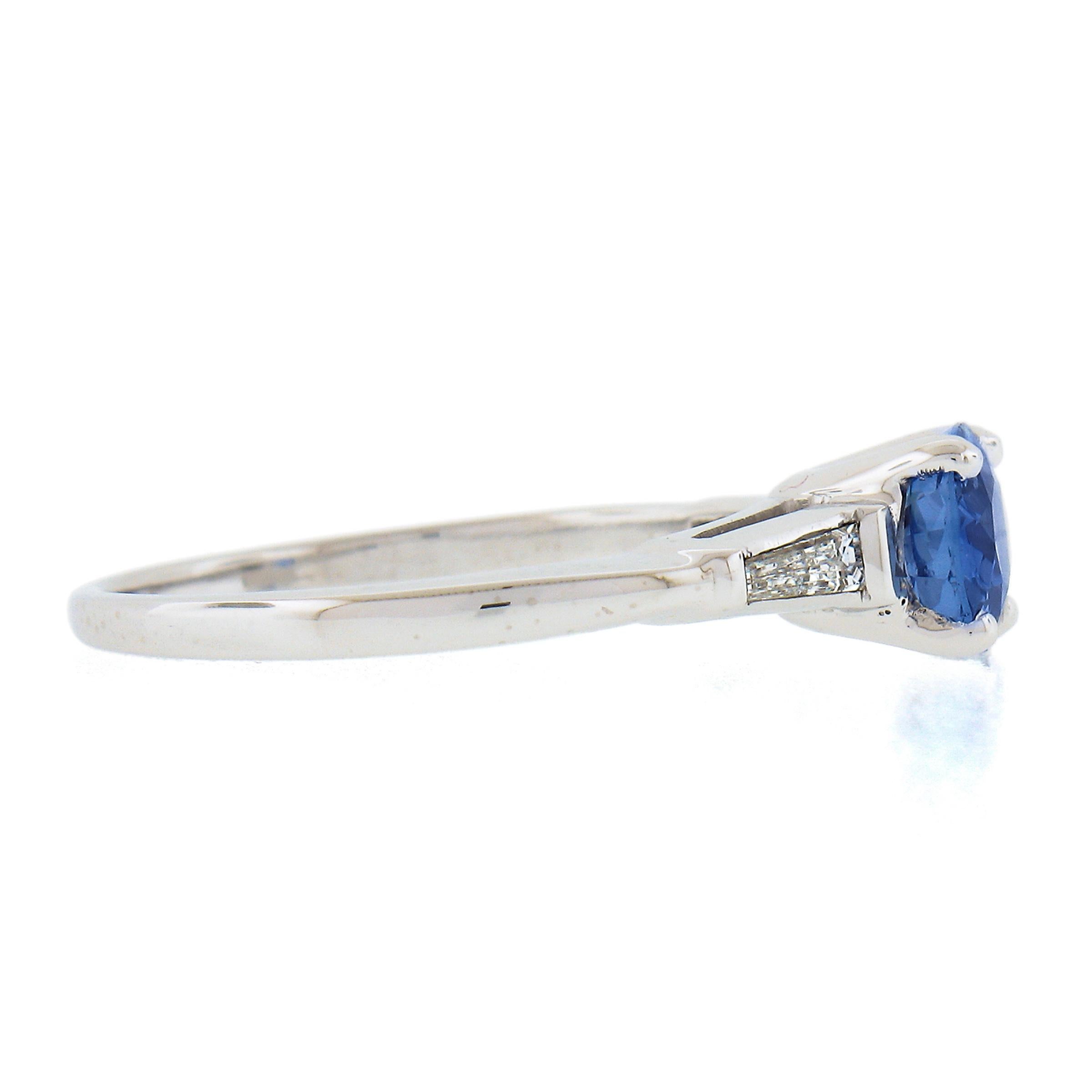 Women's Vintage Platinum 1.82ctw GIA Oval Blue Sapphire & Tapered Baguette Diamond Ring For Sale