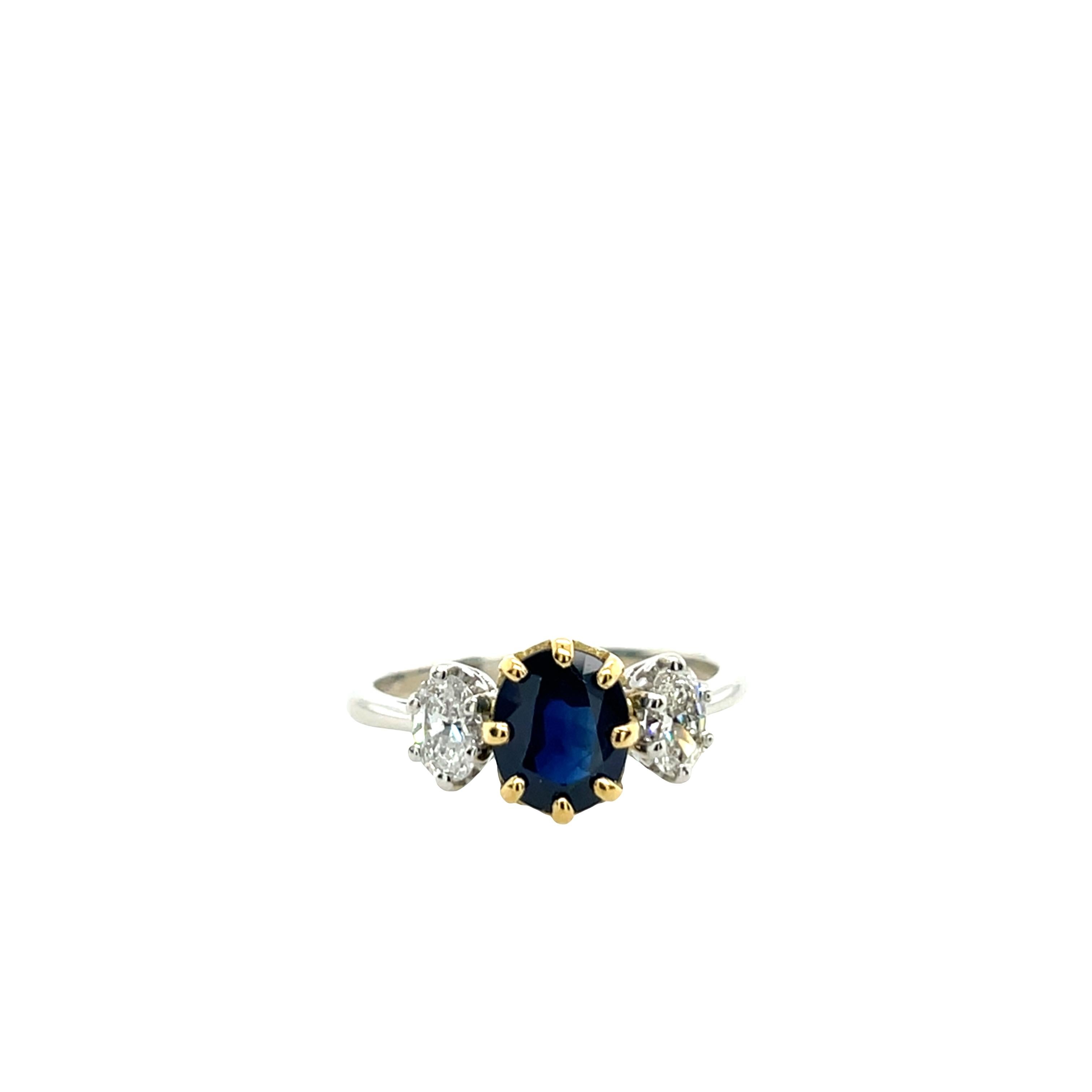 Vintage Platinum & 18ct Yellow Gold 3 Stone Ring With an Oval Sapphire & 2 Oval Brilliant Cut Diamonds
Total Diamond Weight: 0.50ct 
Sapphire Weight: 1.58ct
Diamond Colour: H
Diamond Clarity: SI1
Total Weight: 4.11g  
Ring Size: N
SMS10367