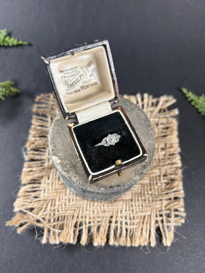 Vintage Diamond Ring

Platinum Stamped 

Circa 1920’s 

Looking for a timeless and unique engagement ring? Look no further than this stunning vintage piece. Crafted using a 0.74ct natural diamond dating back to the 1920s, this stone has been given