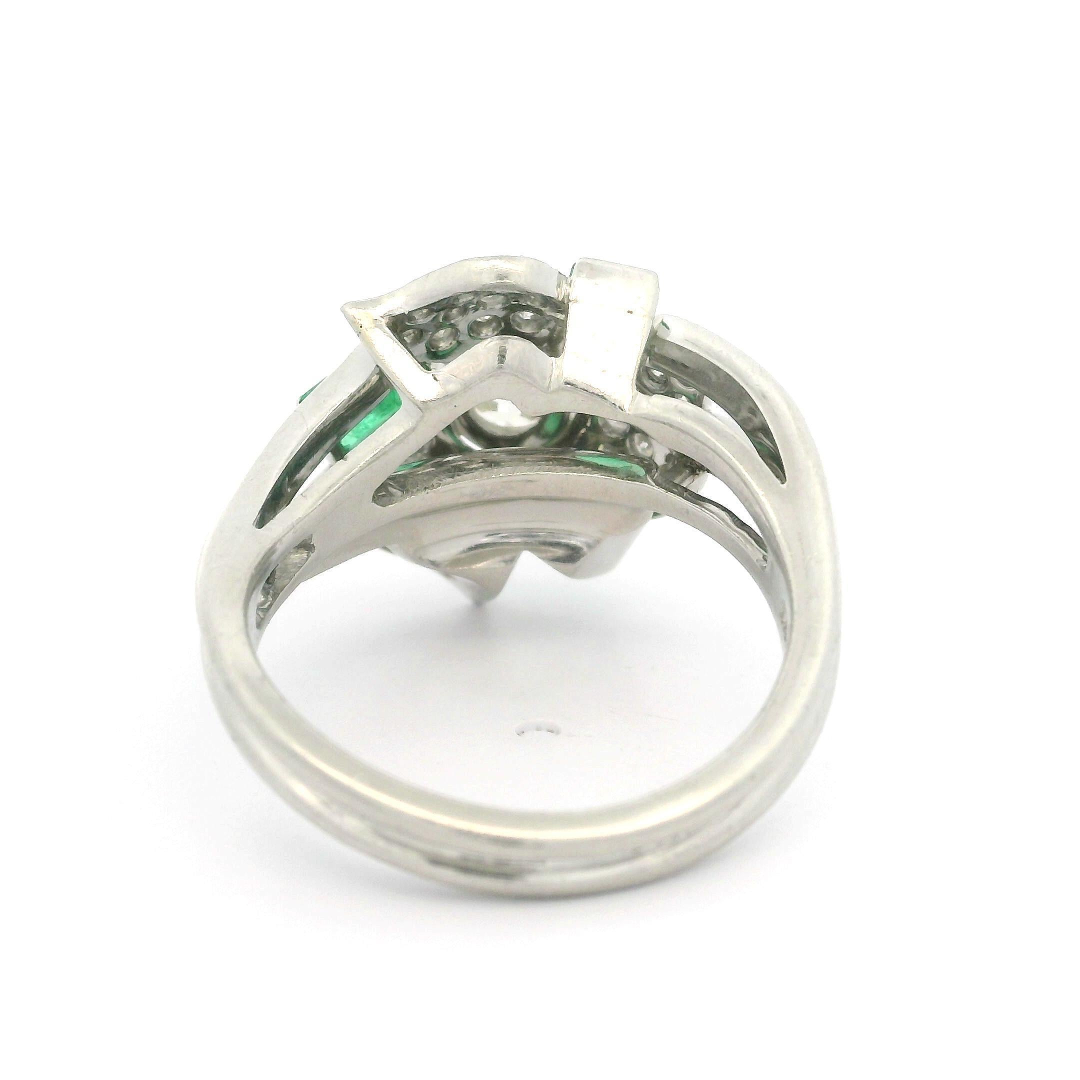 -- Stone(s)-- 
(33) Natural Genuine Diamonds - Single Cut - Pavé Set - H/I Color - VS1-SI2 Clarity - 0.33ctw (approx.)
(3) Natural Genuine Emeralds - Emerald Cut - Channel Set - Rich Green Color - 0.65ctw (approx.)
(1) Natural Genuine Diamond - Old