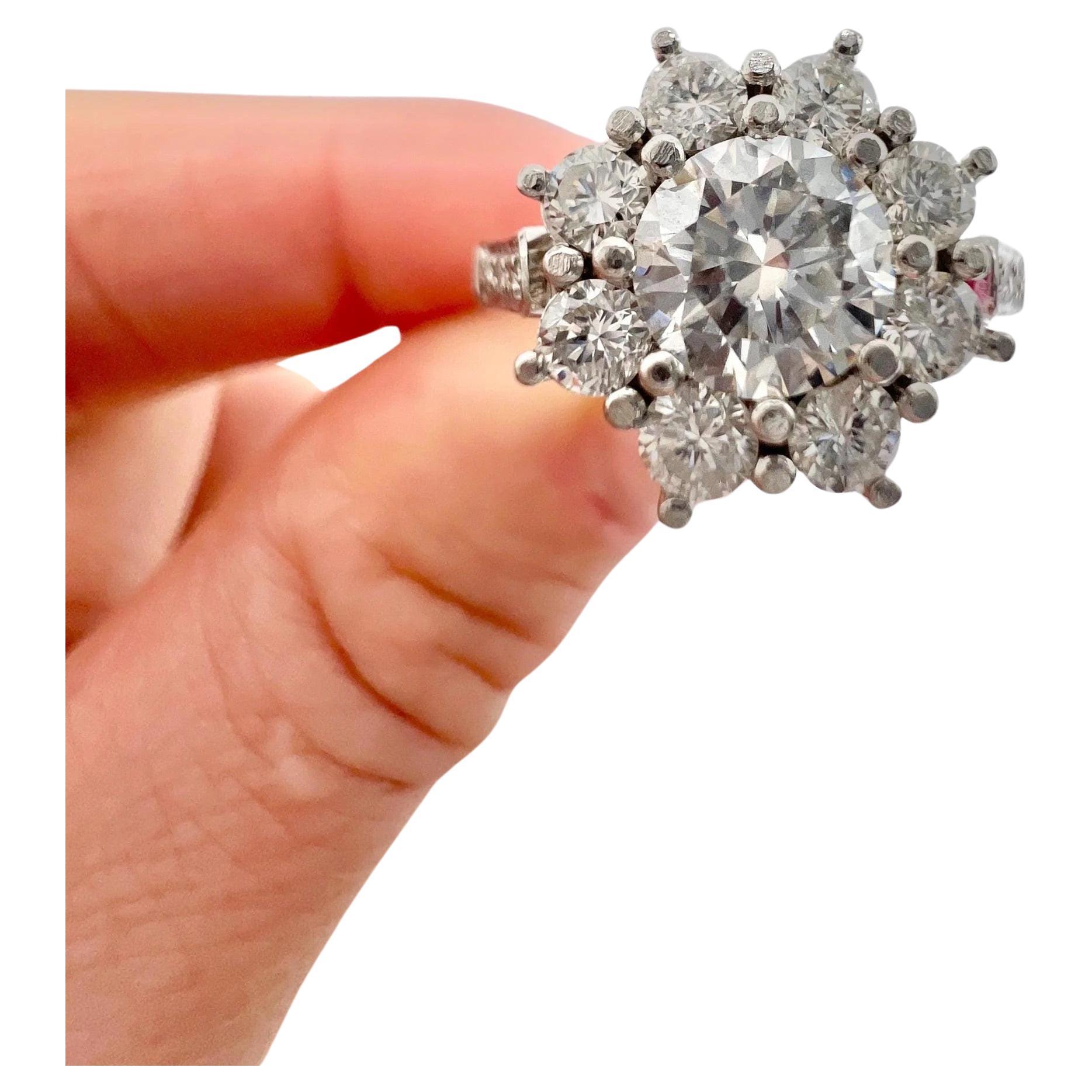 Vintage Platinum, 1980s 1.35 Carat Diamond Daisy Cluster Ring