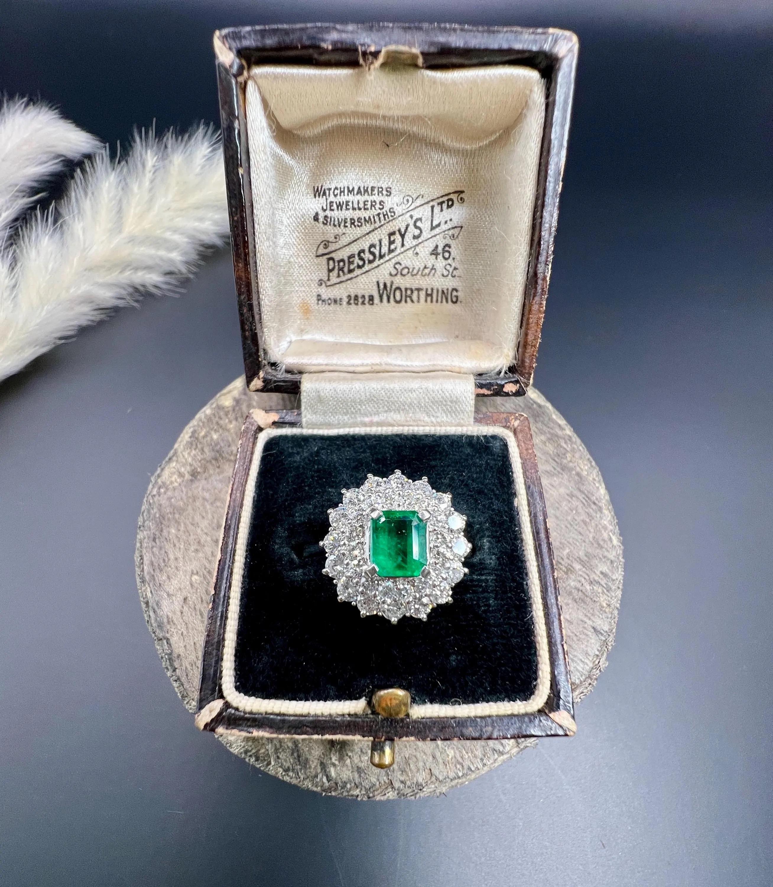 Vintage Platinum 1980s Emerald & Brilliant Cut Diamond Cluster Ring For Sale 3