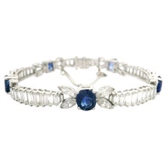 Bracelet ligne vintage en platine, saphir 20 carats et diamants baguettes et marquises