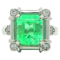 Anello vintage in platino con smeraldo colombiano e diamante GIA da 2,17 ct.