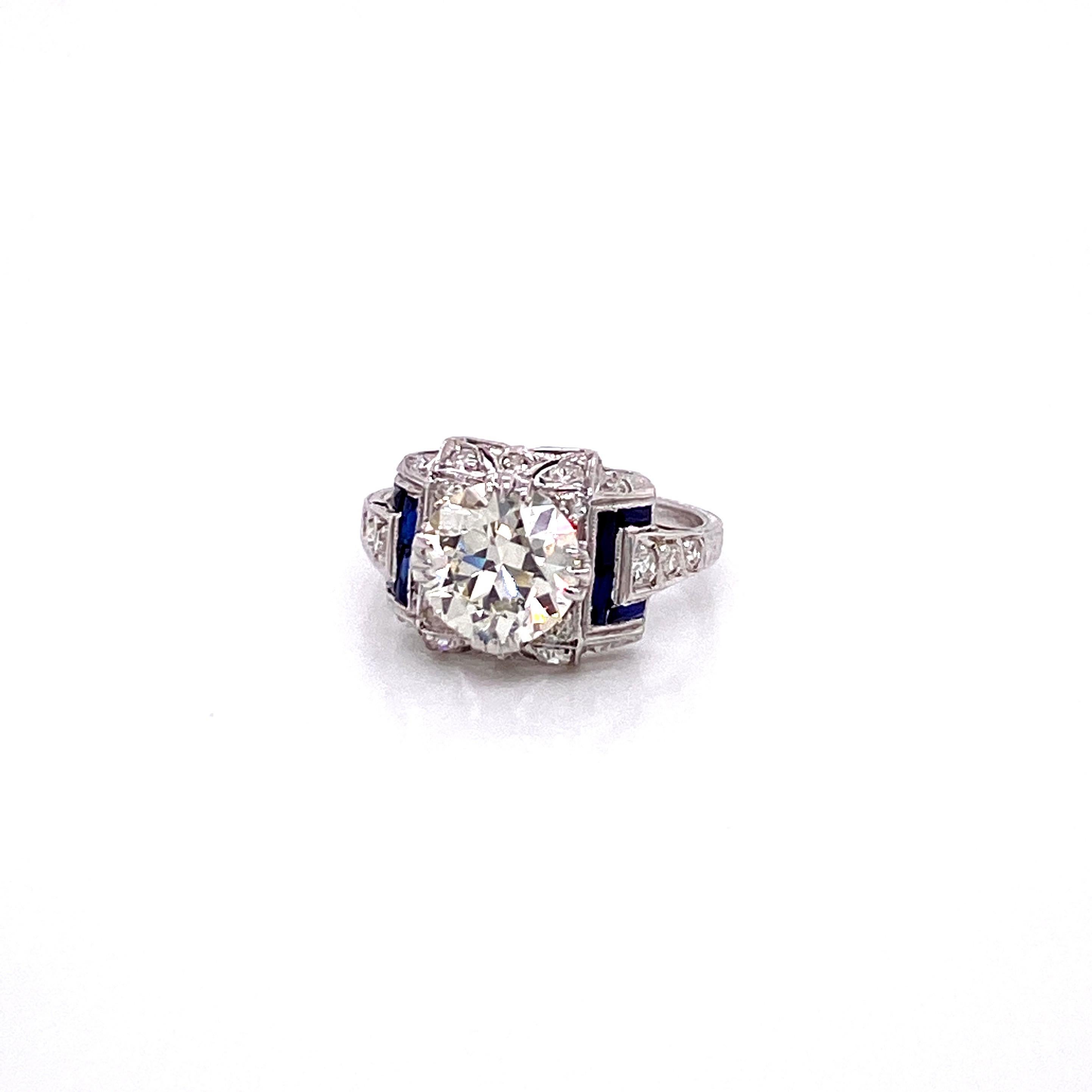 Vintage Platin Diamant Verlobungsring Circa 1930er Jahre - Die Mitte europäischen Schnitt Diamant wiegt 2,23ct und hat M Farbe und VS2 Kalität. Der Diamant ist in 4 dreifachen Zacken in der Nord-Süd-Ost-West-Richtung gefasst. Der Ring enthält ein