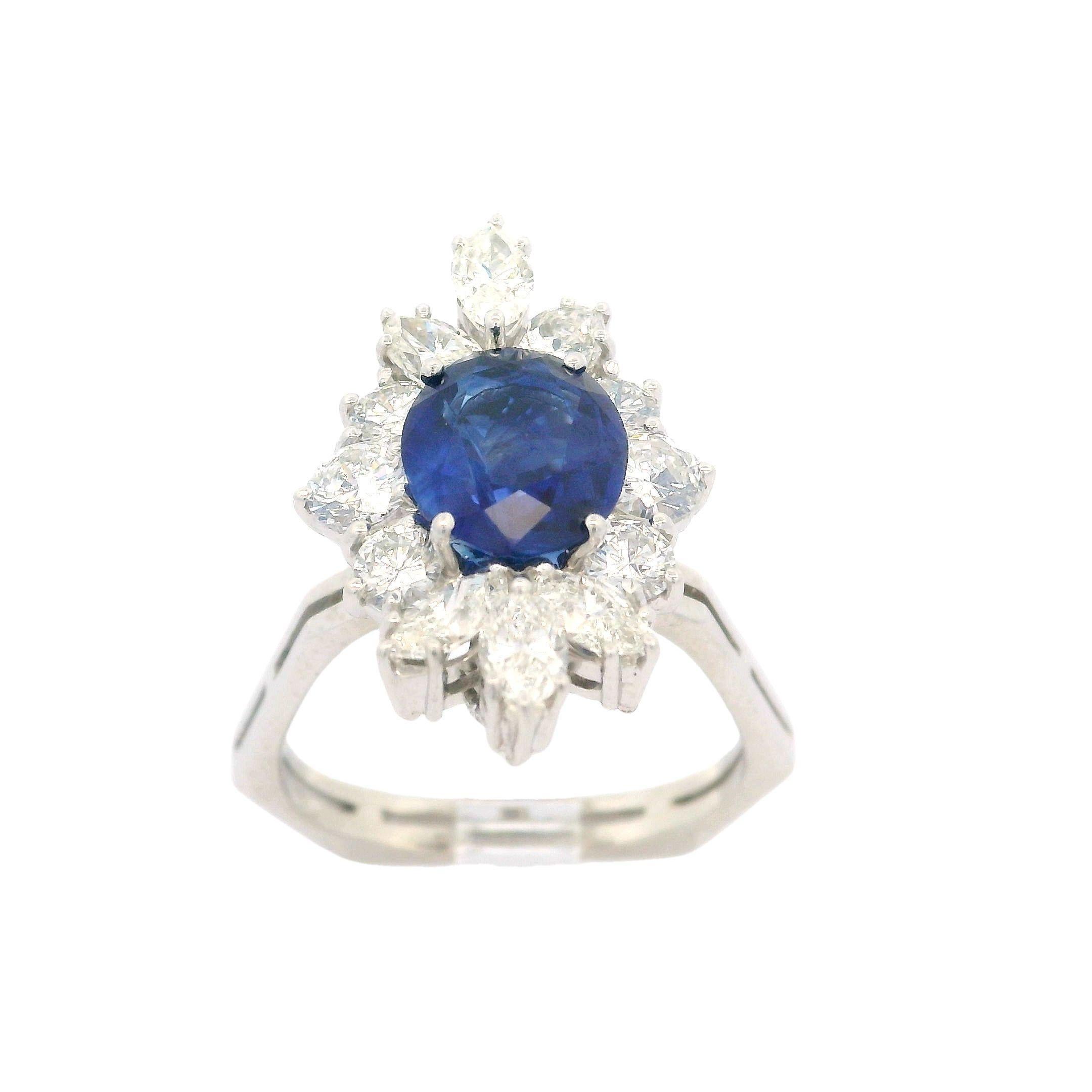 --Stone(s):--
(1) Natural Genuine Sapphire - Oval Brilliant Cut - Prong Set - True Royal Blue Color - Heated - 1.80ct (approx. based on the certification details)
** See Certification Details Below for Complete Info **
(12) Natural Genuine Diamonds