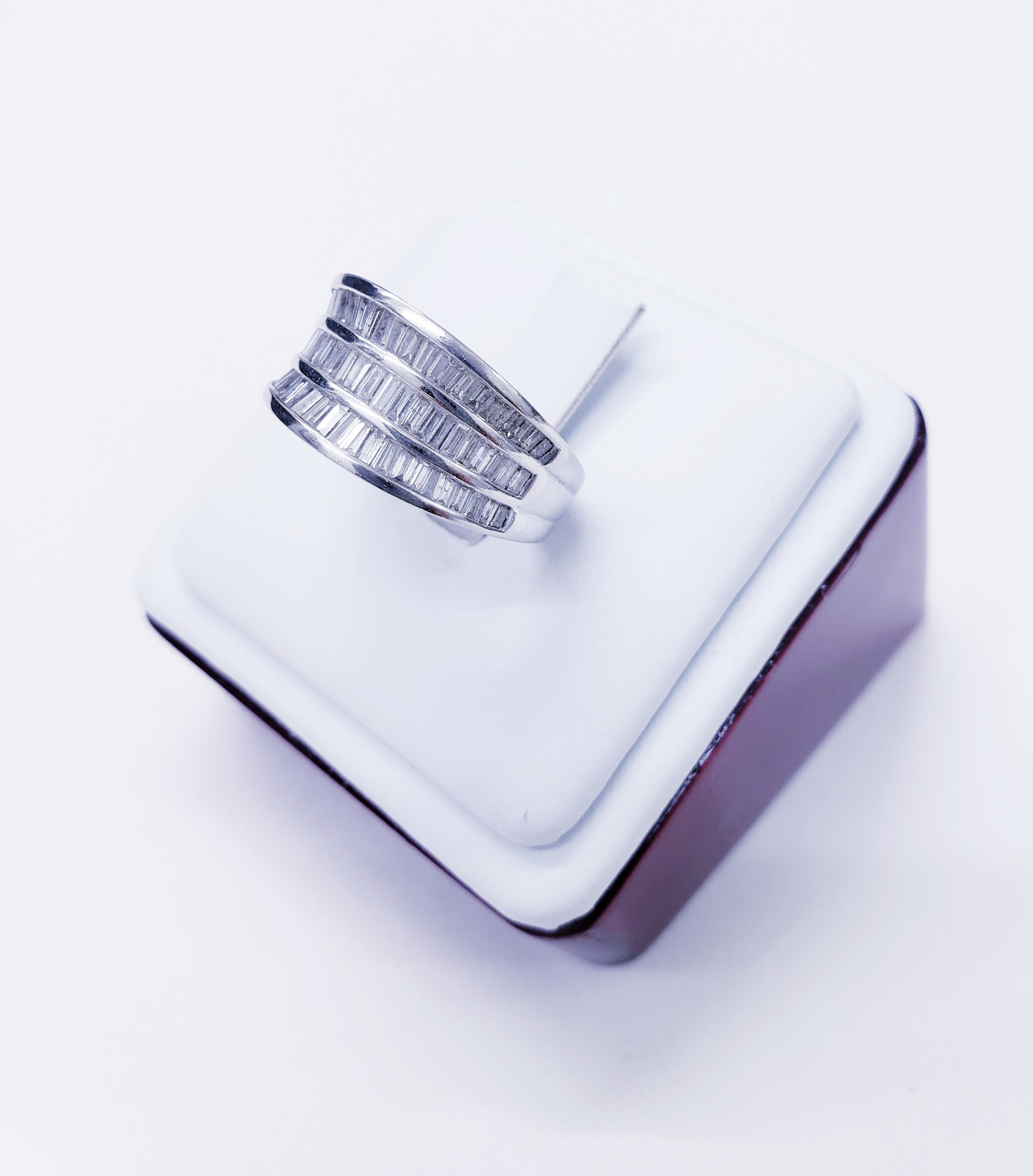 Artisan Vintage Platinum 3.00 Carat Three-Row Tapered Baguette Diamonds Band Ring For Sale