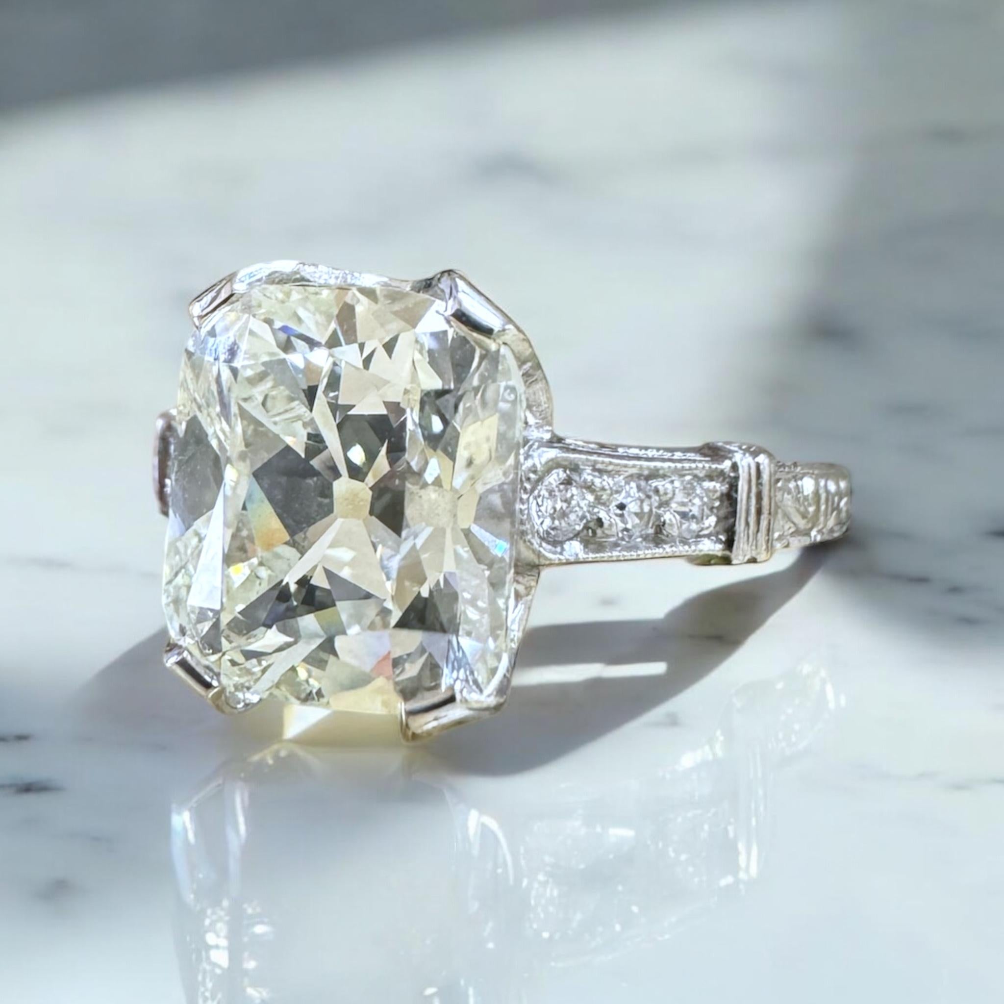 We are thrilled to offer this vintage beauty!!
We RARELY see beautiful elongated old mine cut solitaires!!

Ring Details
Material: Platinum
Era: Art Deco 1920 - 1940
Head Length: 9.8mm
Head Height: 5mm
Shank Width: Tapering to 1.5mm
Weight: 3.6