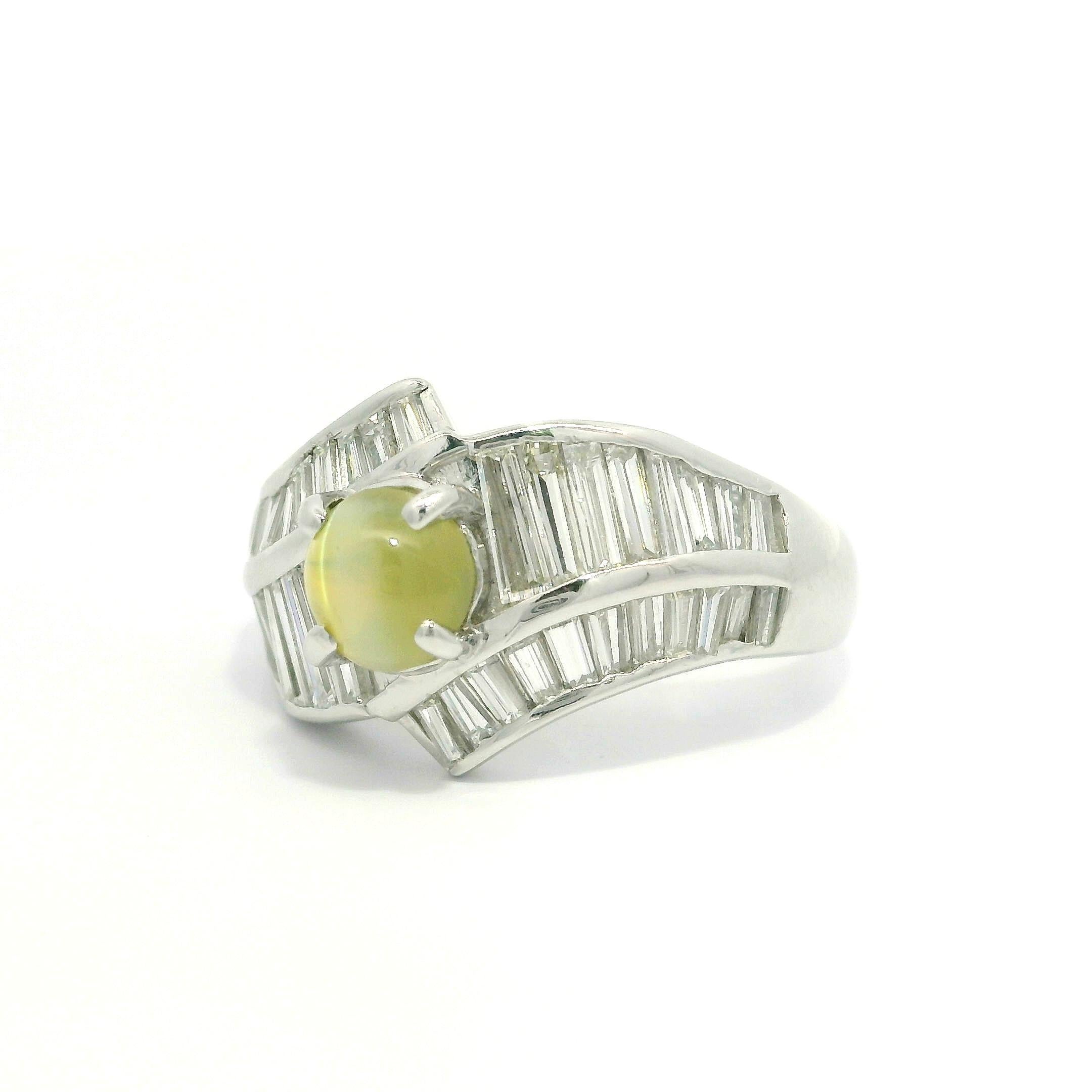 --Pietre: --
(1) Crisoberillo naturale a occhio di gatto - taglio cabochon ovale - incastonato - alta qualità con occhio affilato - 1,39ct (esatto - timbrato)
(38) Diamanti naturali autentici - taglio a baguette - incastonati - colore bianco