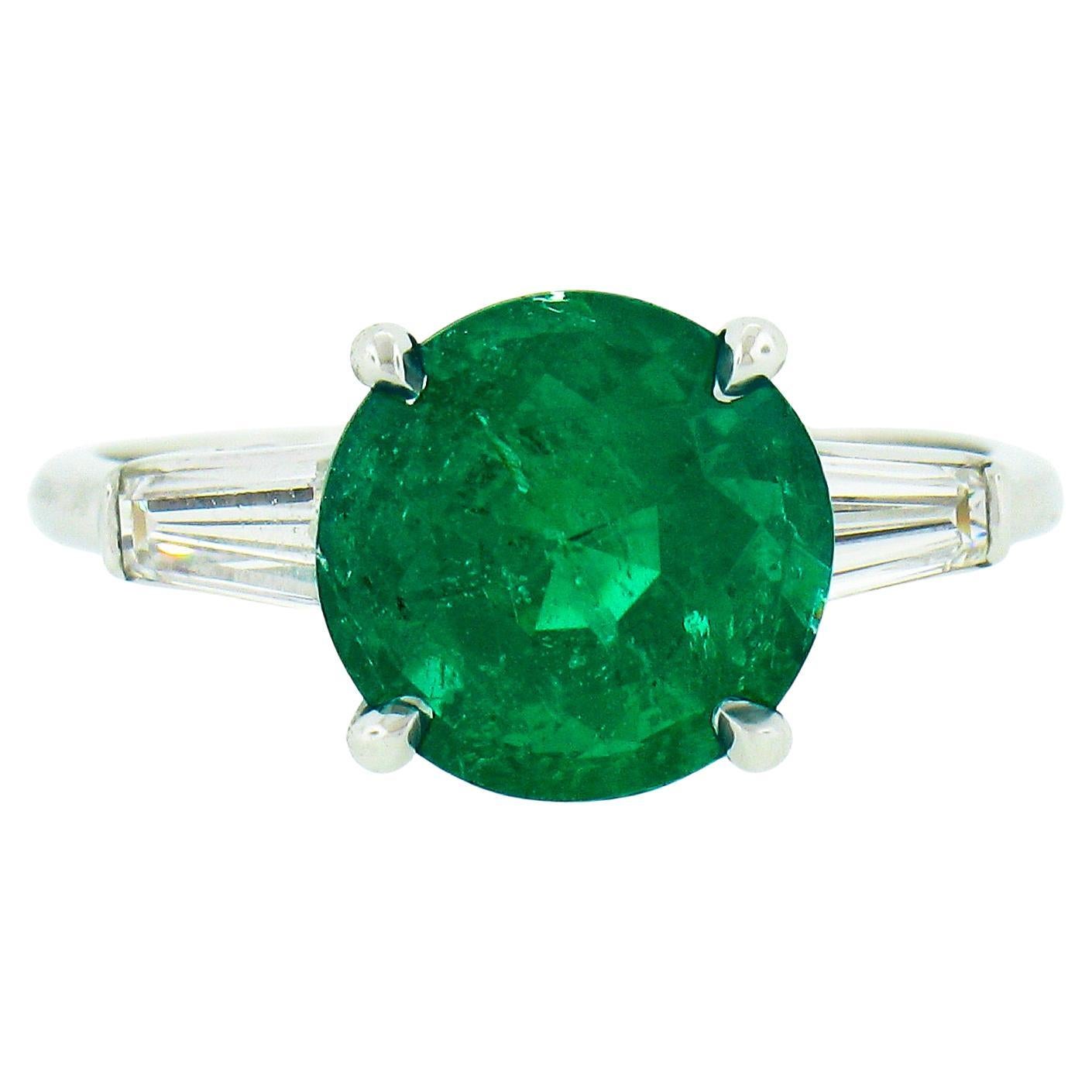 Vintage Platinum 3.04ctw GIA Round Brilliant Green Emerald Baguette Diamond Ring For Sale