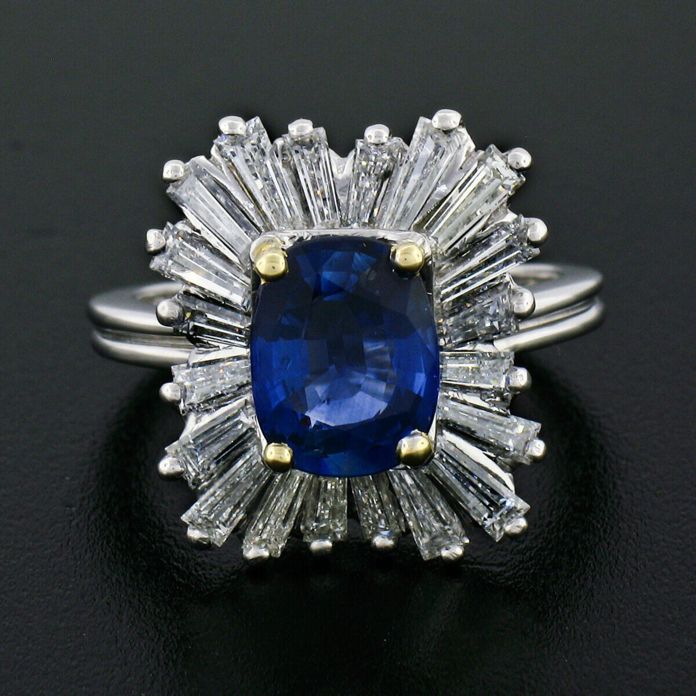This absolutely stunning, ballerina style ring is very well crafted in solid platinum. It features a magnificent, AGL certified, natural sapphire stone prong set at its center. This sapphire is SUPER FINE quality and has the richest royal blue color