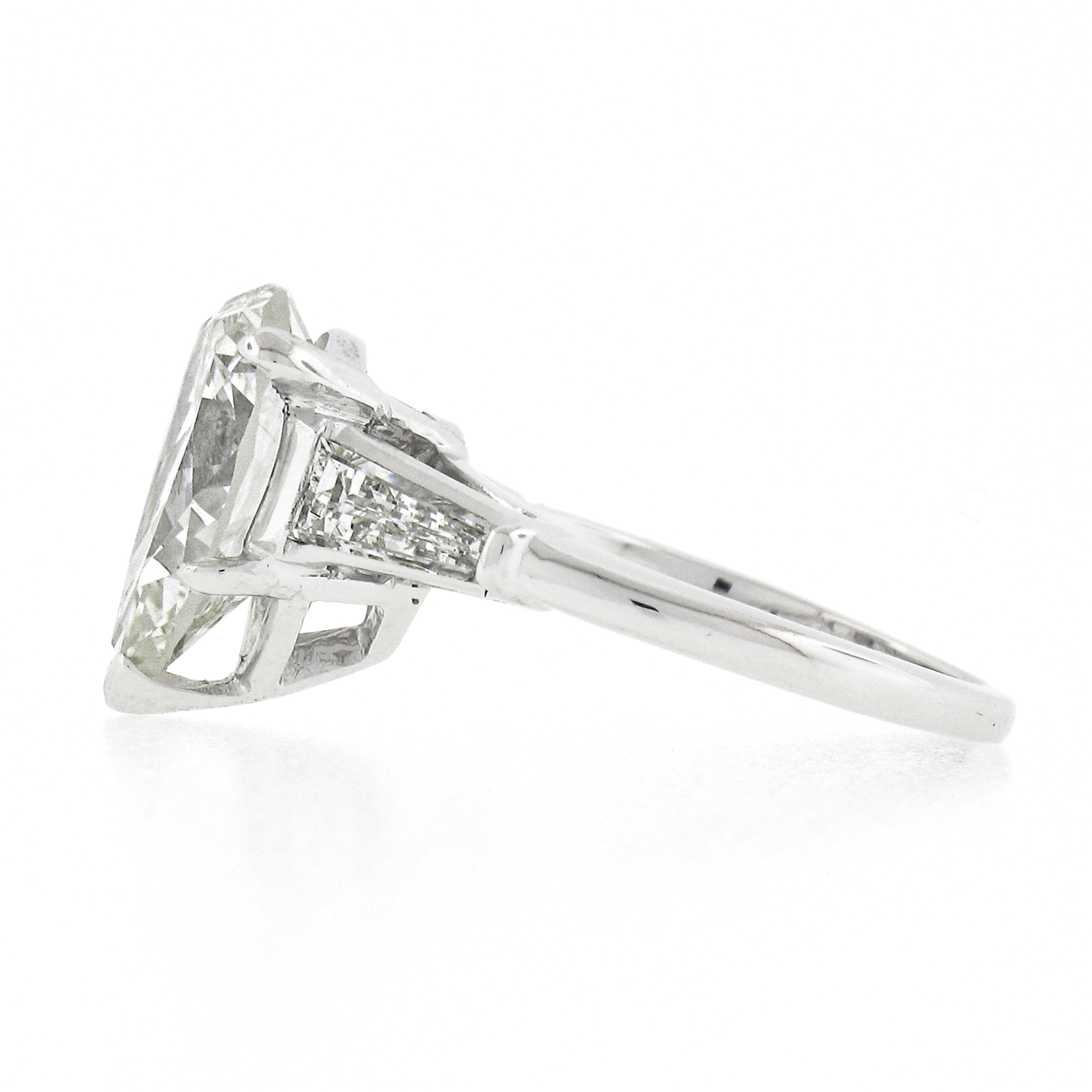 Women's Vintage Platinum 3.02ctw GIA Pear Brilliant & Baguette Diamond Engagement Ring For Sale