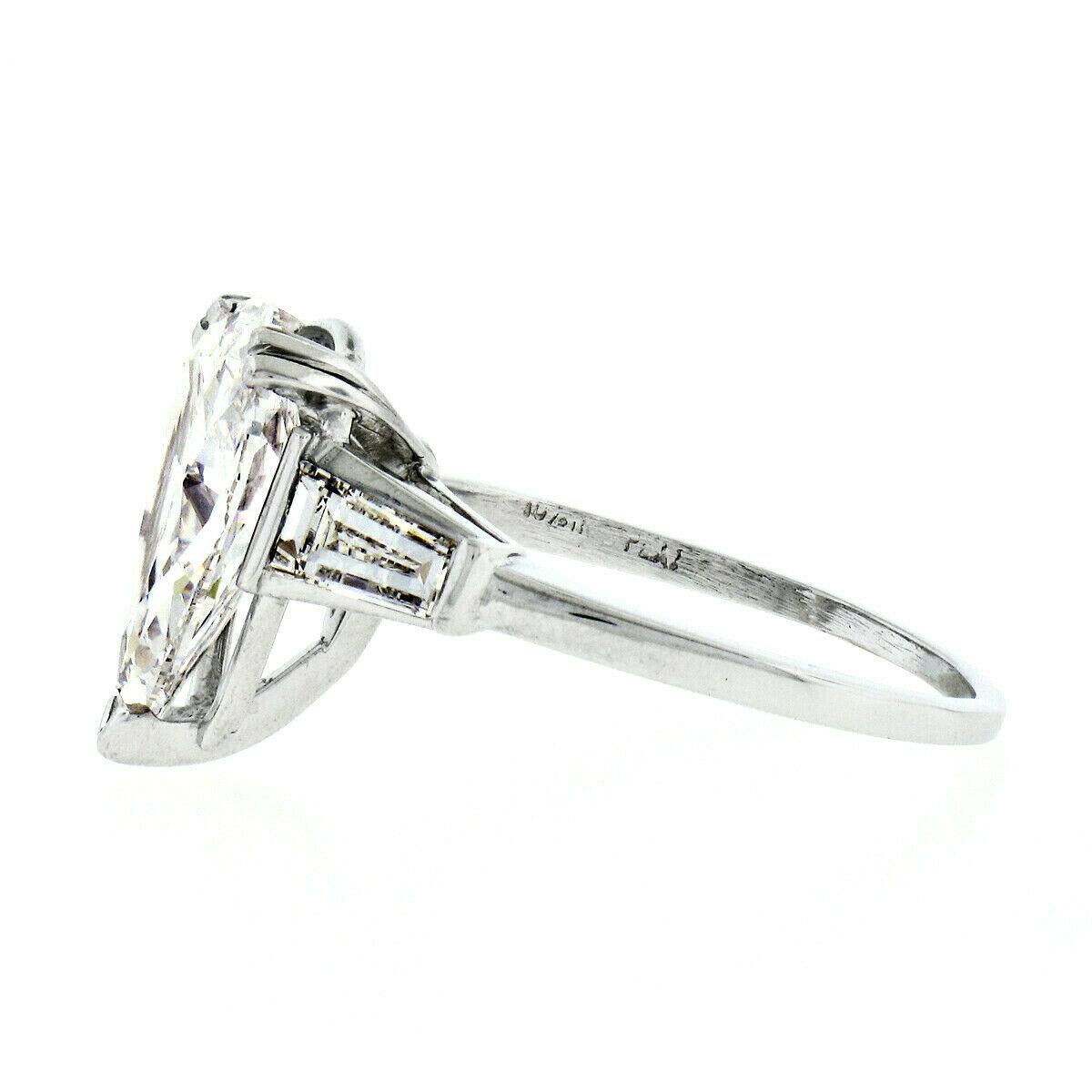 Women's Vintage Platinum 4.24 Carat GIA E VS2 Pear and Baguette Cut Diamond Ring