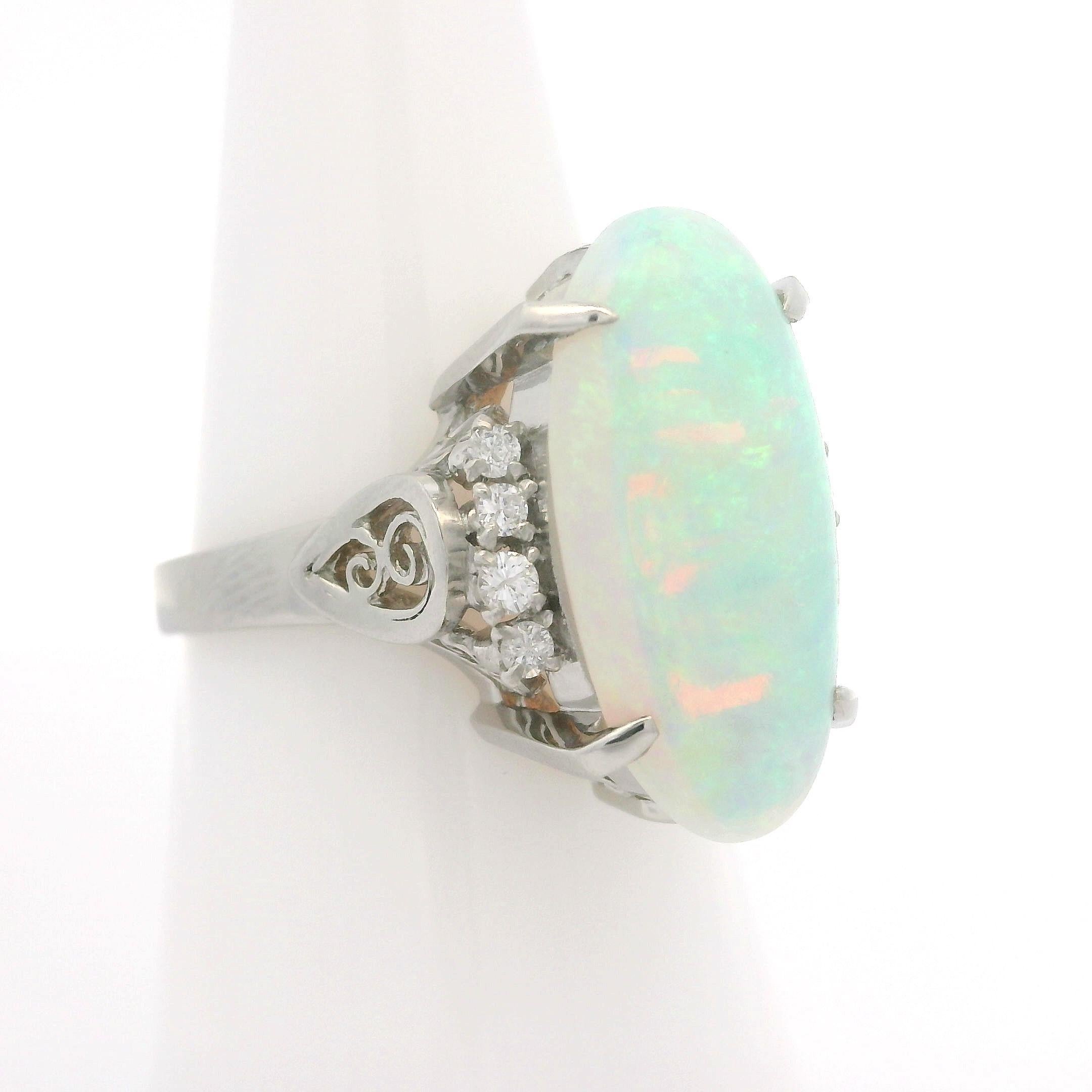 Vintage Platinum 4.59ctw Elongated Oval Opal & Diamond Cocktail Ring For Sale 6