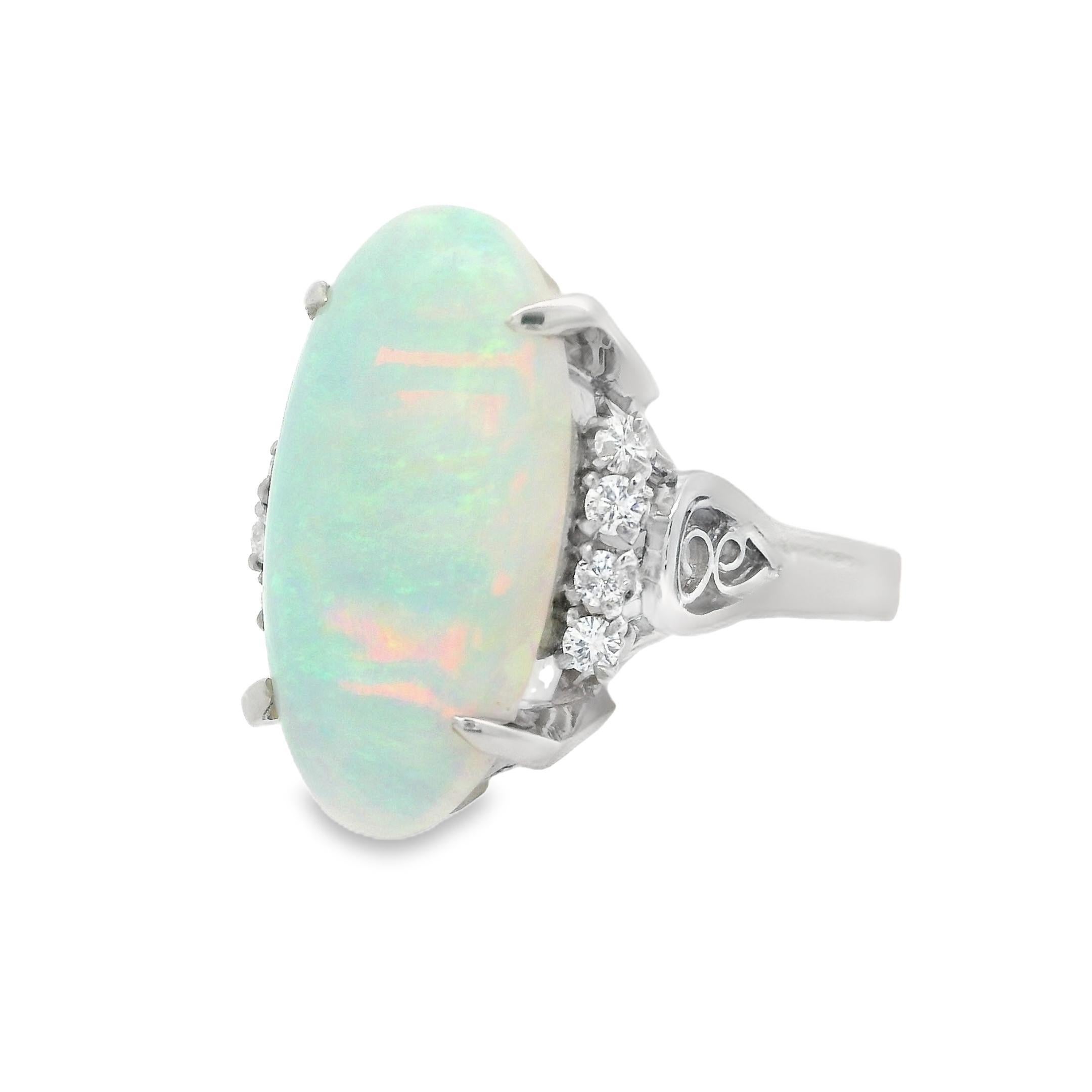 Vintage Platinum 4.59ctw Elongated Oval Opal & Diamond Cocktail Ring For Sale 7